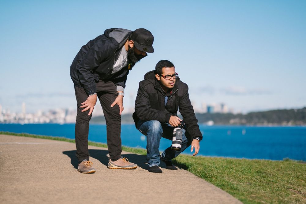 Film Drop checking the angle of a shot at wedding preshoot for a Sri Lankan Tamil couple at Watsons Bay Sydney