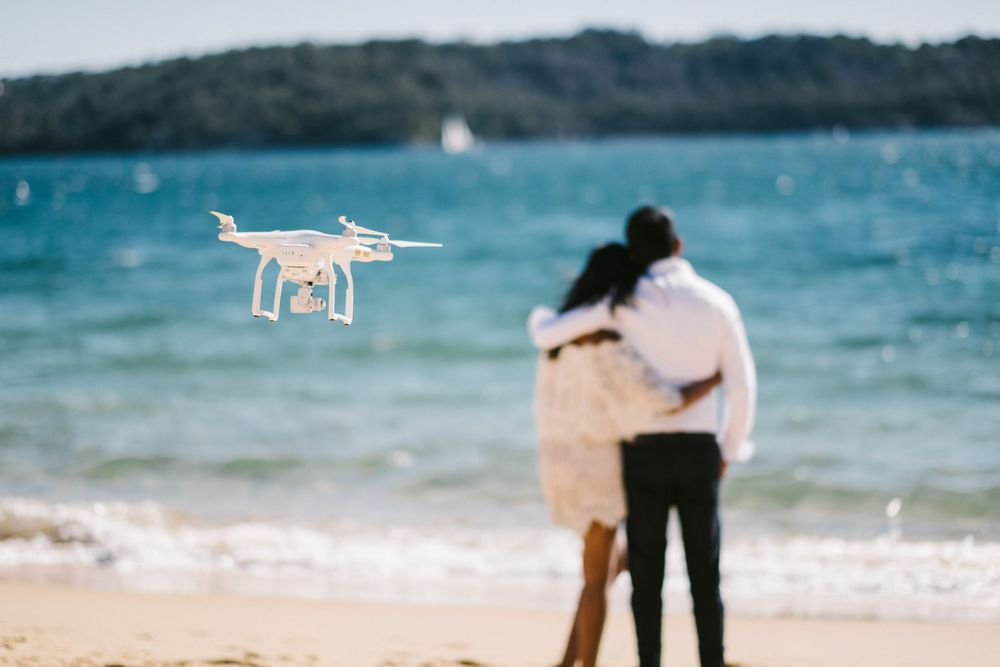 Film Drop getting a drone shot of a Sri Lankan Tamil couple looking out to the ocean at Watsons Bay Sydney
