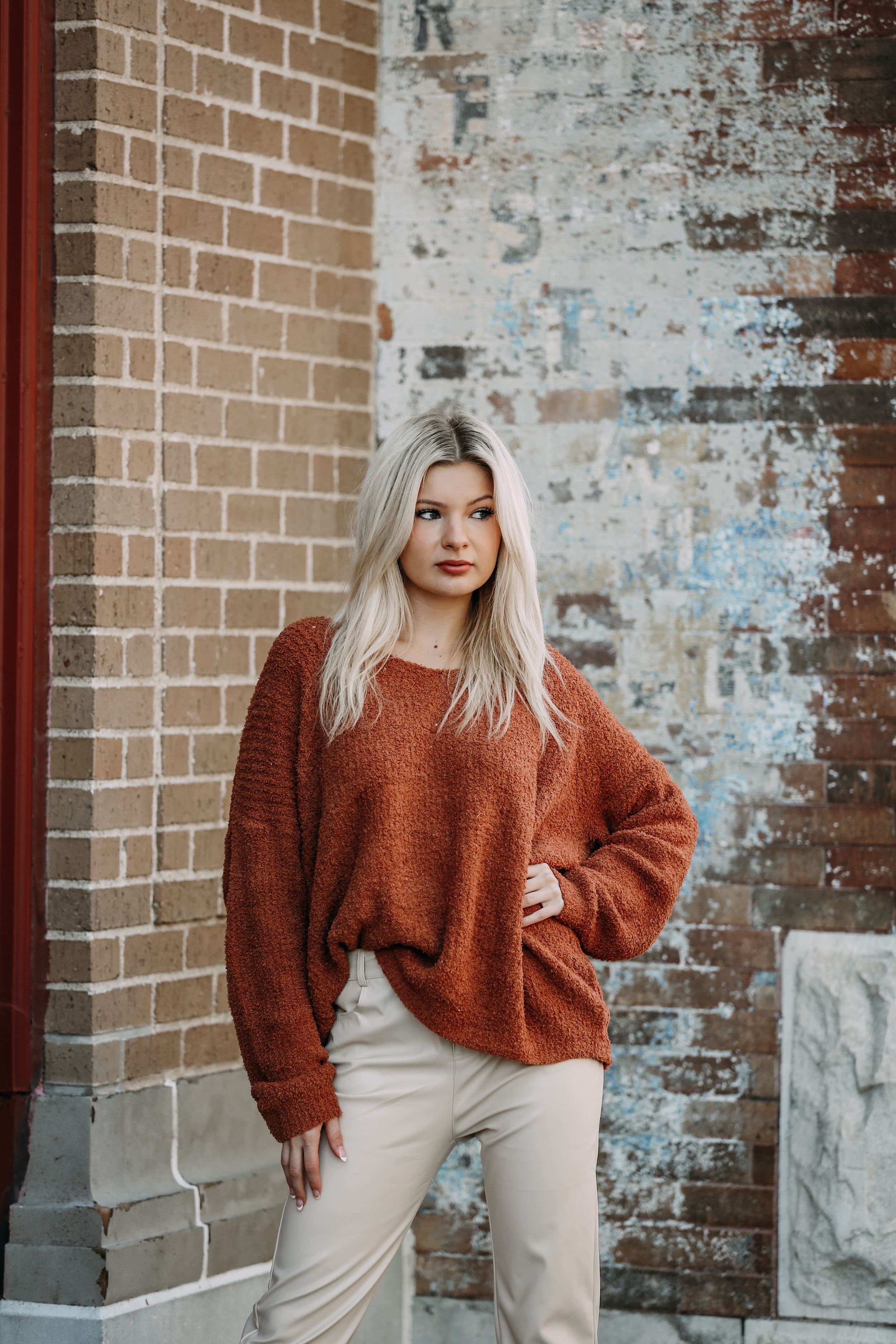 girl posing with hand on hip