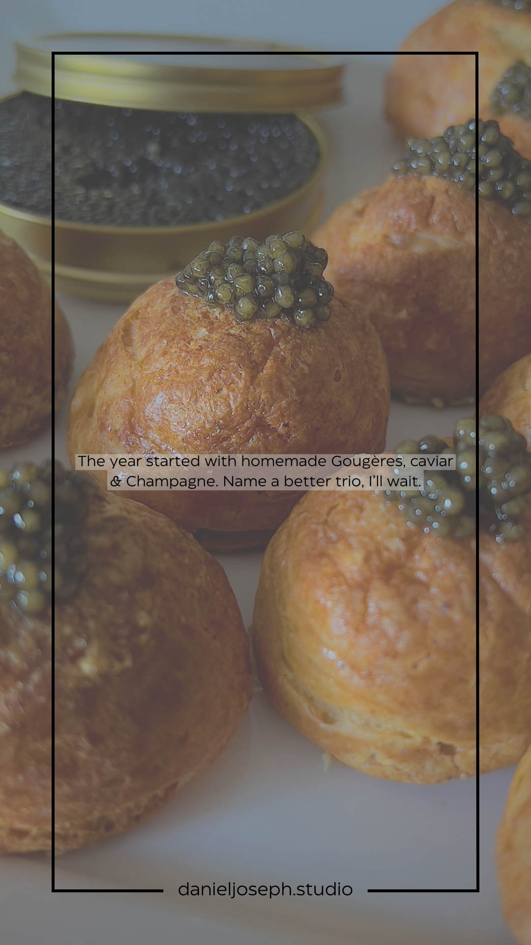 Close-up of gougeres pastries topped with caviar on a serving plate.
