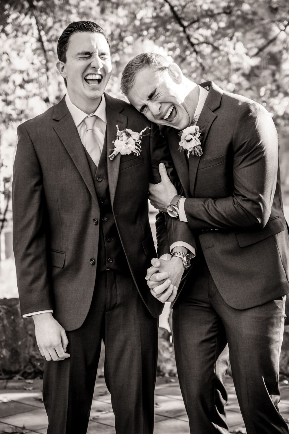 candid moment with groom and best man at ironstone vineyards in murphys ca, ironstone vineyards wedding photographer