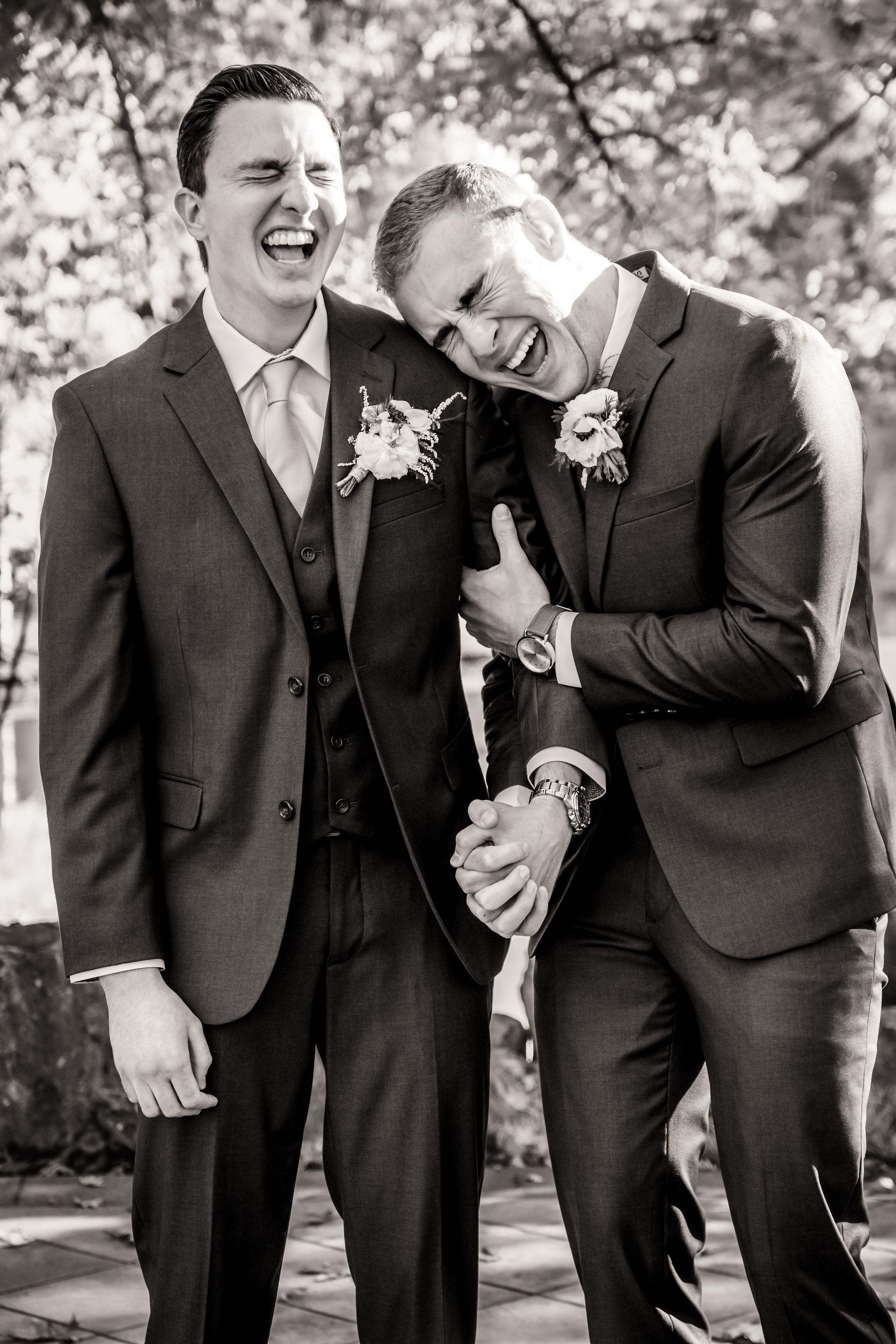 candid moment with groom and best man at ironstone vineyards in murphys ca, ironstone vineyards wedding photographer