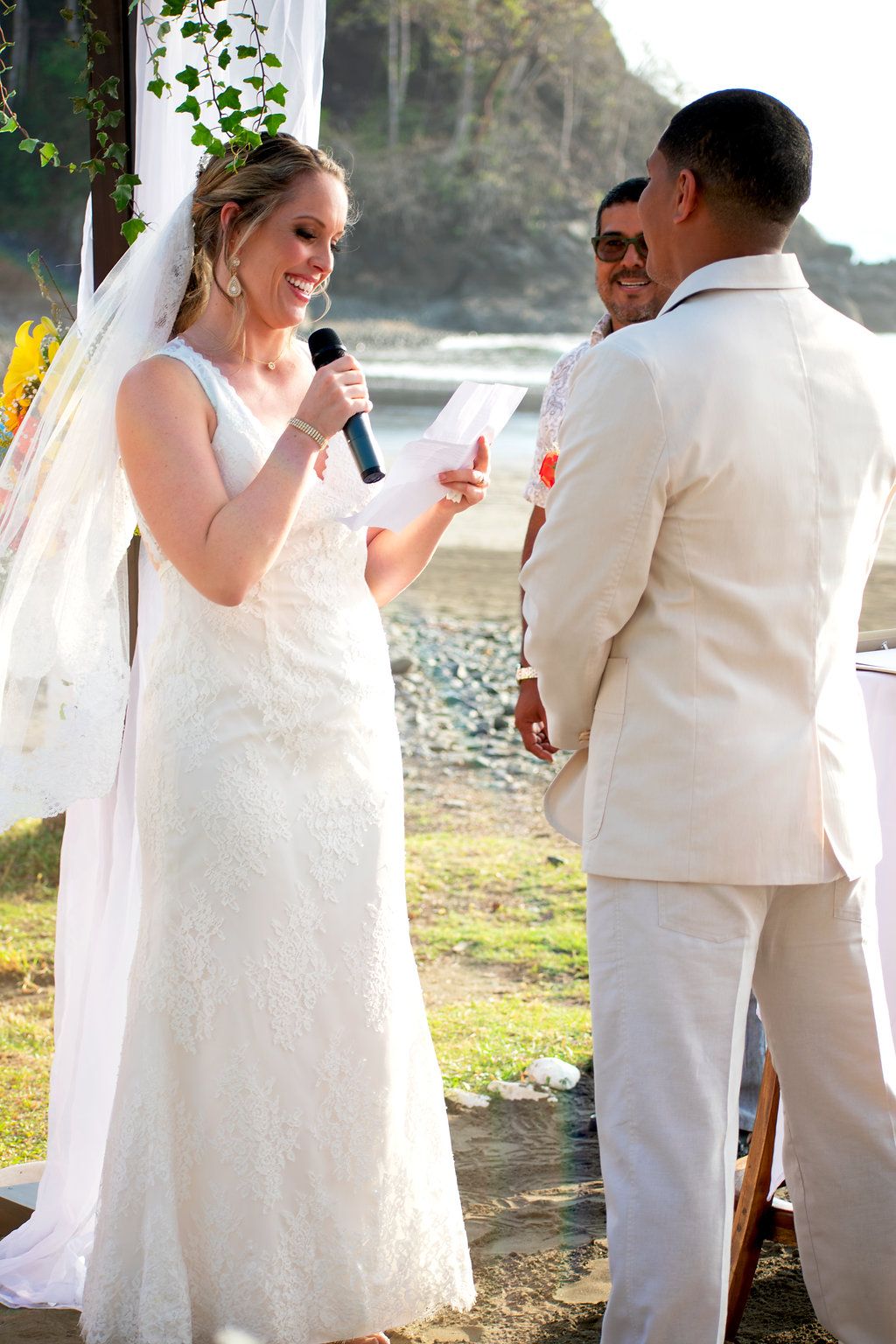 Bride giving vows on the beach in Costa Rica