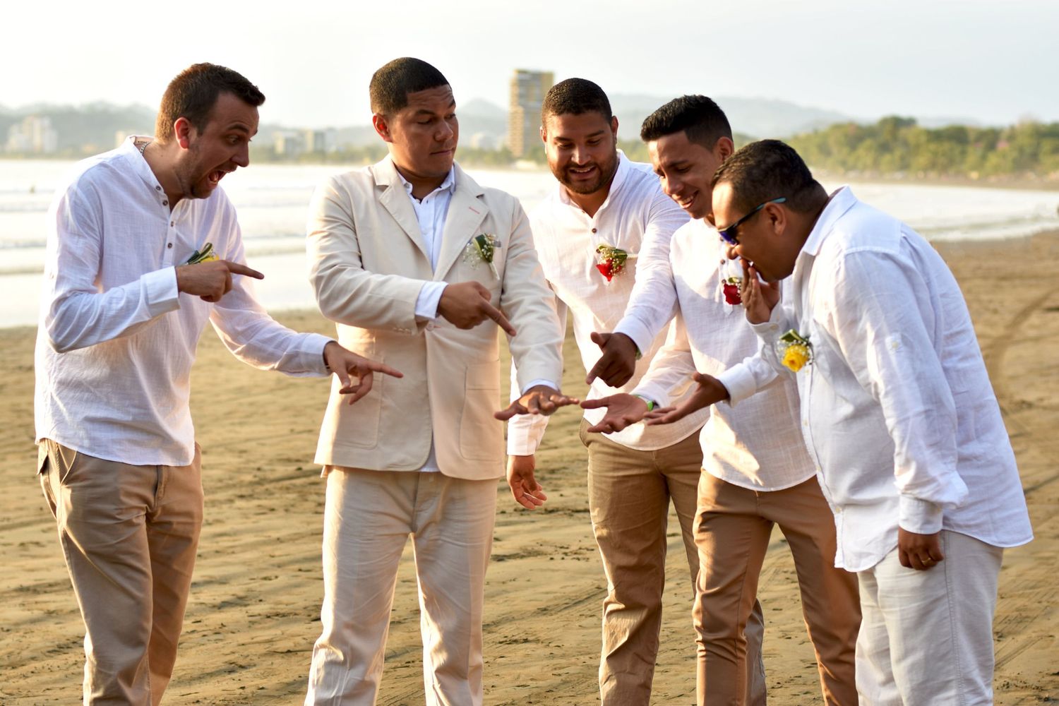 Groomsmen admiring the grooms ring