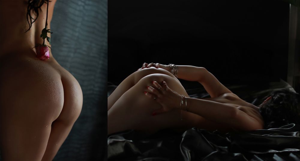 An intimate shadowy portrait showing hands reaching across a dark surface.