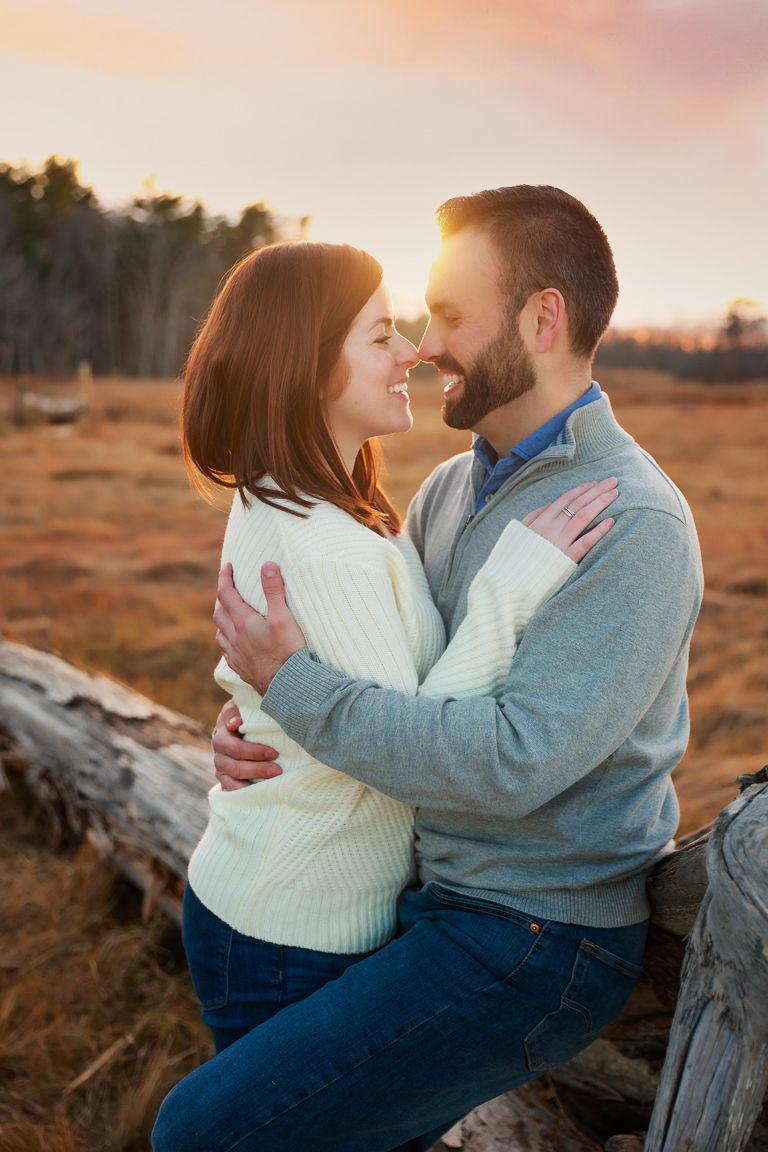 love portraits, engagement photography, couple photographer in Portsmouth New Hampshire. couple hugging in the sunset