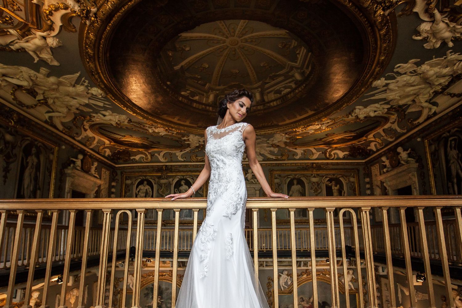 A stunning bridal portrait on the balcony at Moor Park Golf Club in Rickmansworth