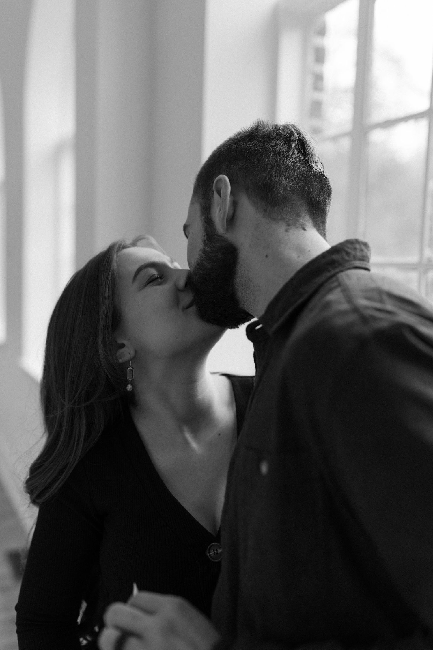 Romantic black and white sequence showing tender moments between a couple.