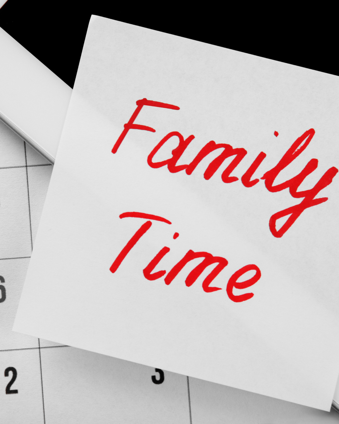 The word 'Family' written in red text across white paper cards.  L Visions Photography