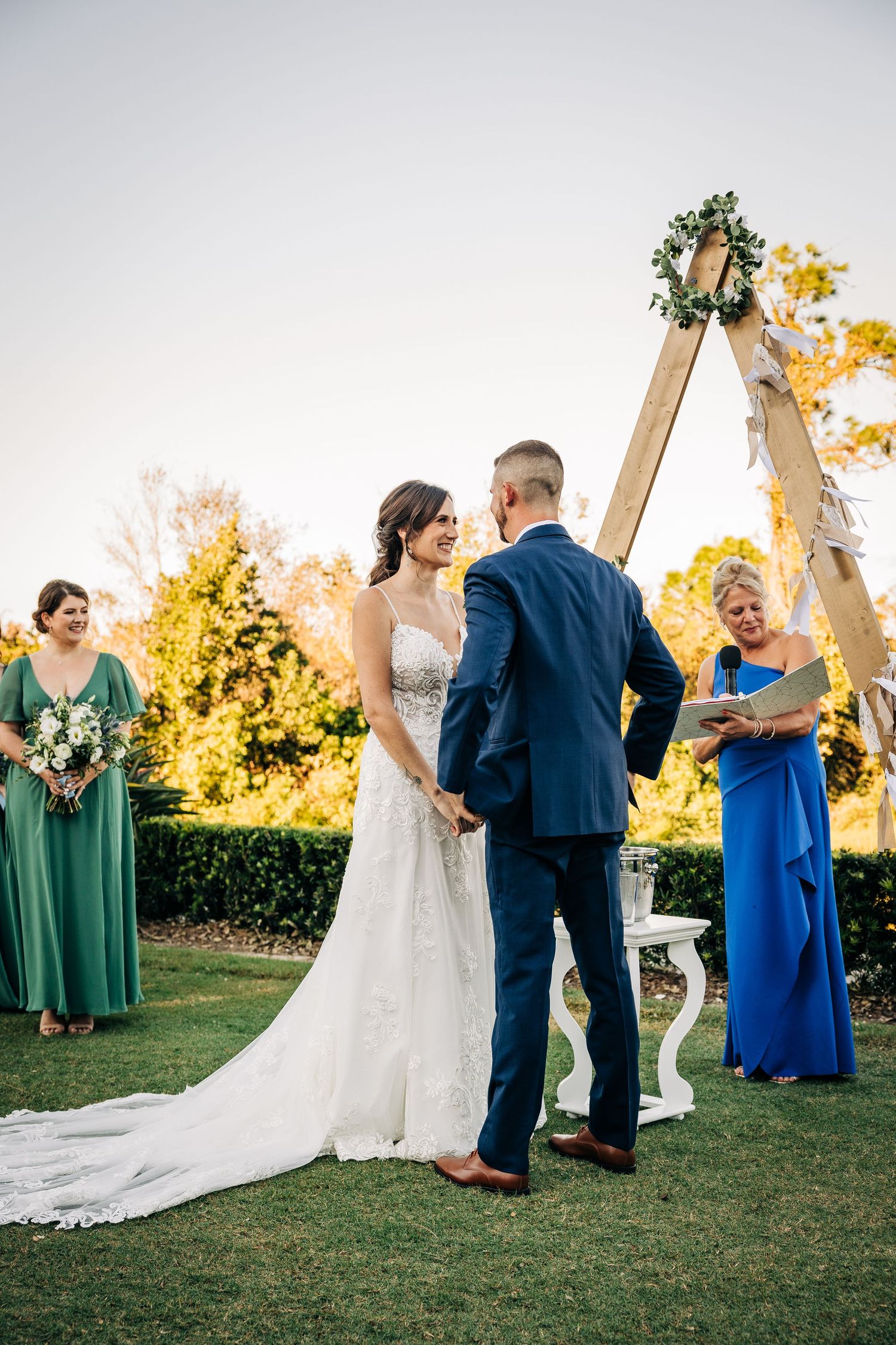 Bride and groom at the alter at Lakewood Ranch Gulf and Country Club photographed by Sarasota Wedding Photographer.