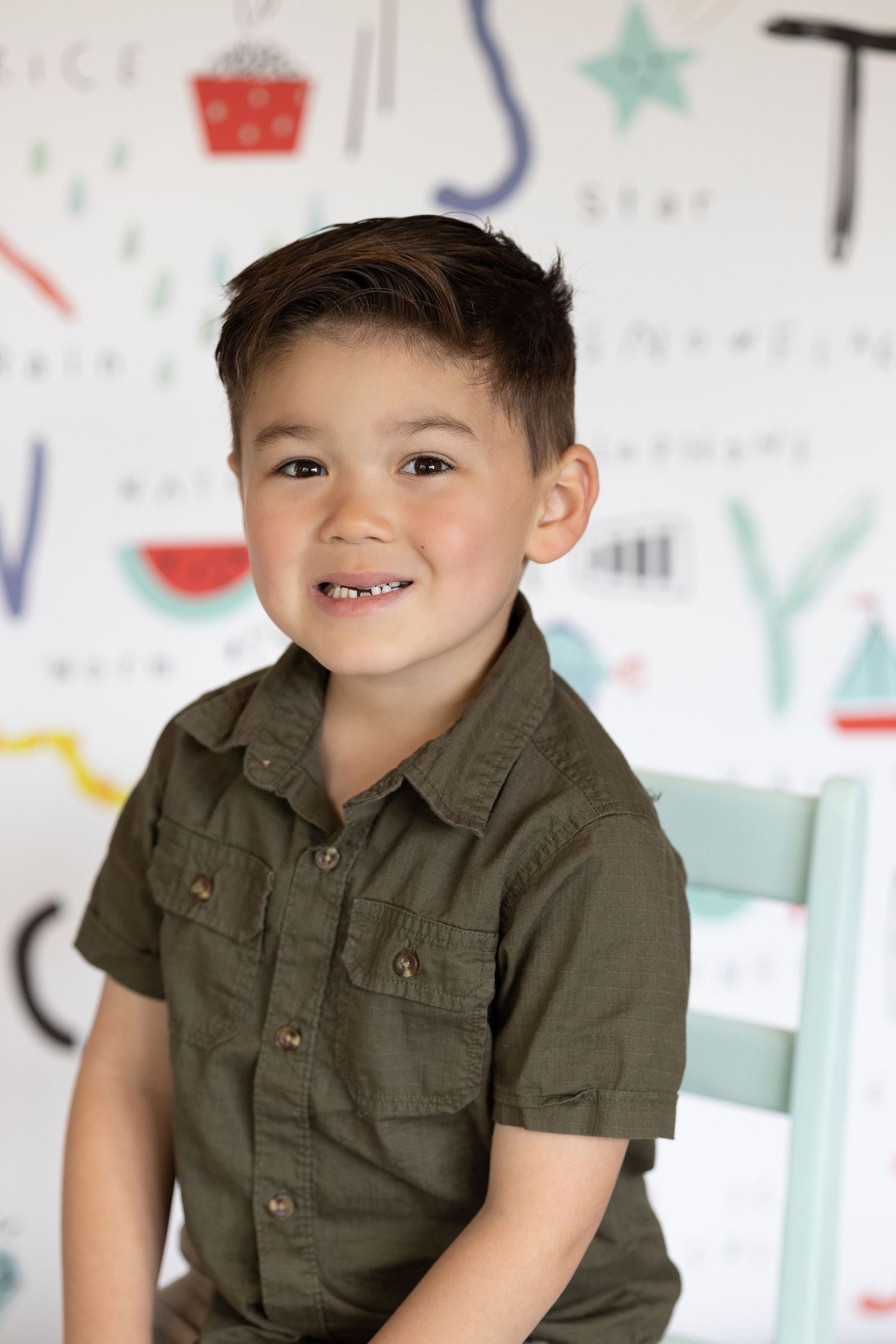 Young boy posing for school photos