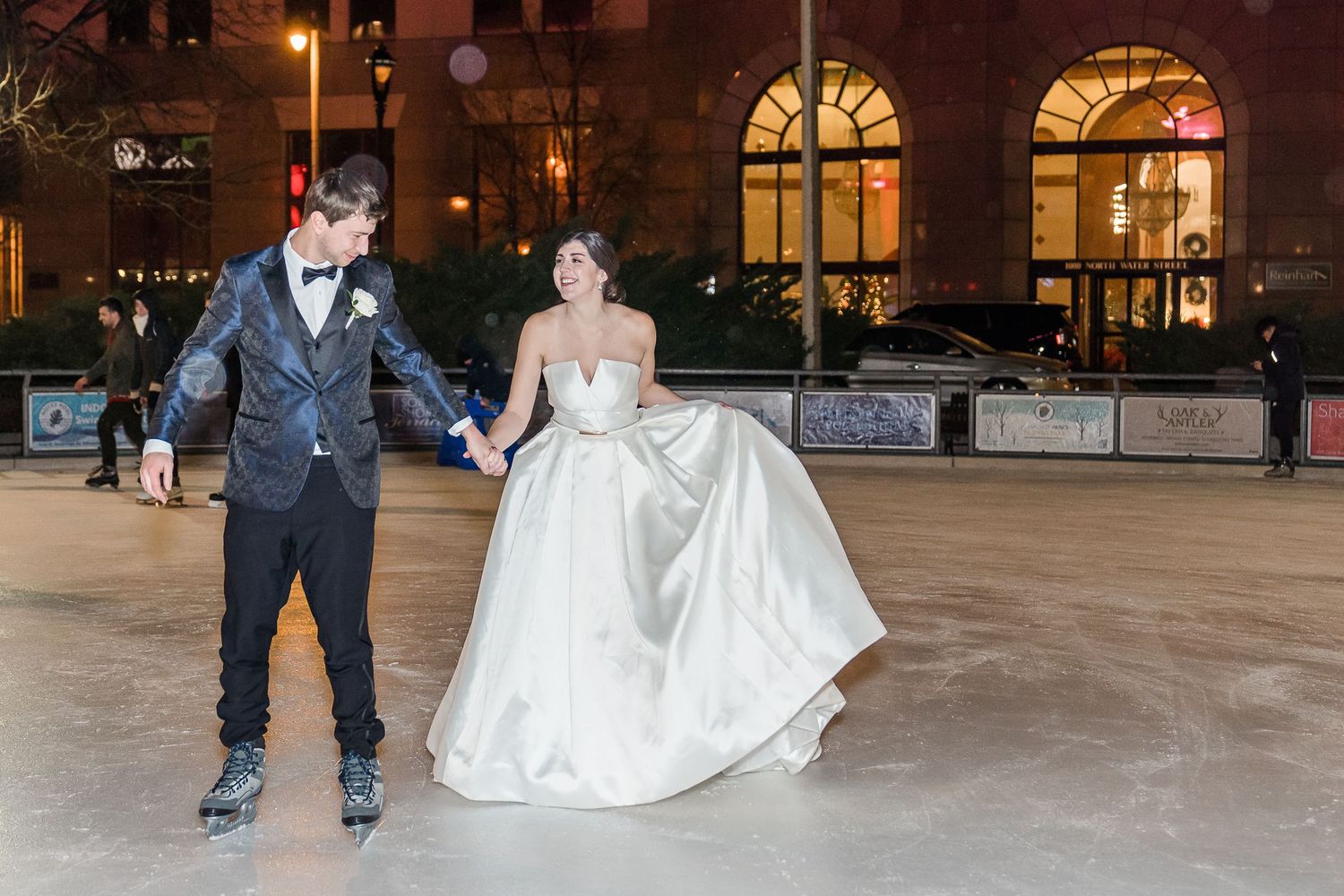 bride and groom wedding photographer ice skating red arrow park just married milwaukee wisconsin photographer kenosha