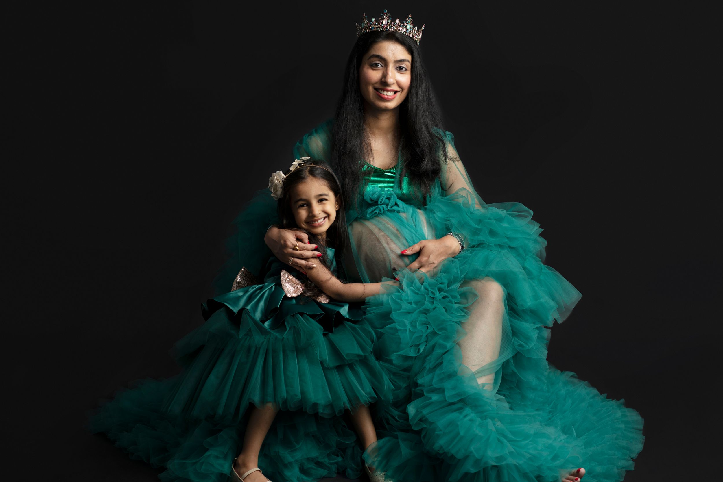 purple fabric maternity lady with his daughter  - Jasmeet K Photography