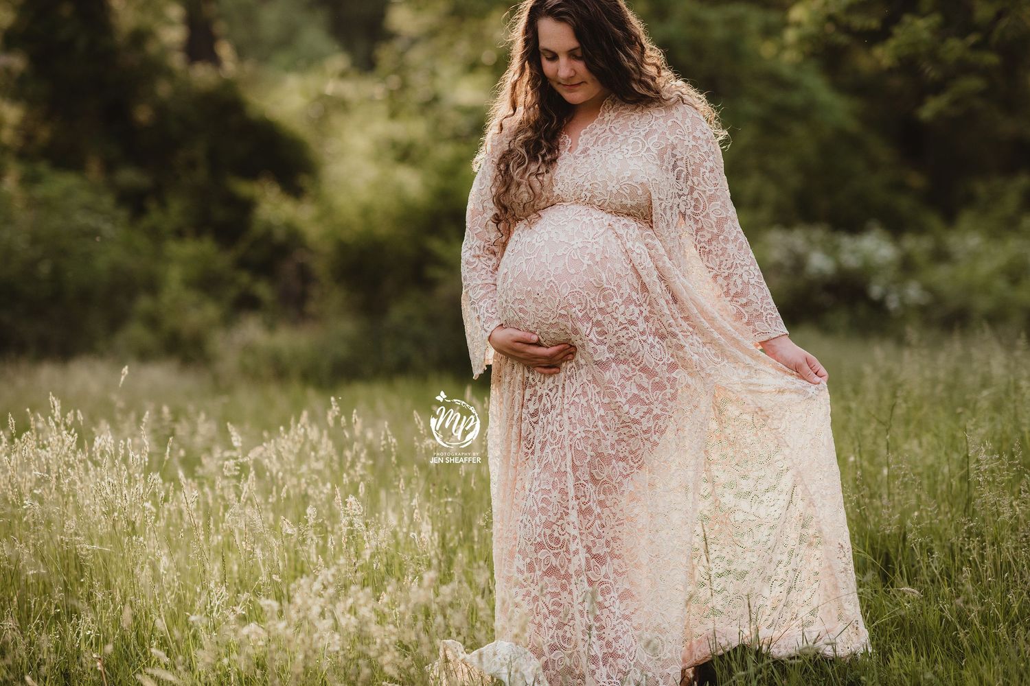 maternity with dress that is available for clients to use located in her meadow in the spring