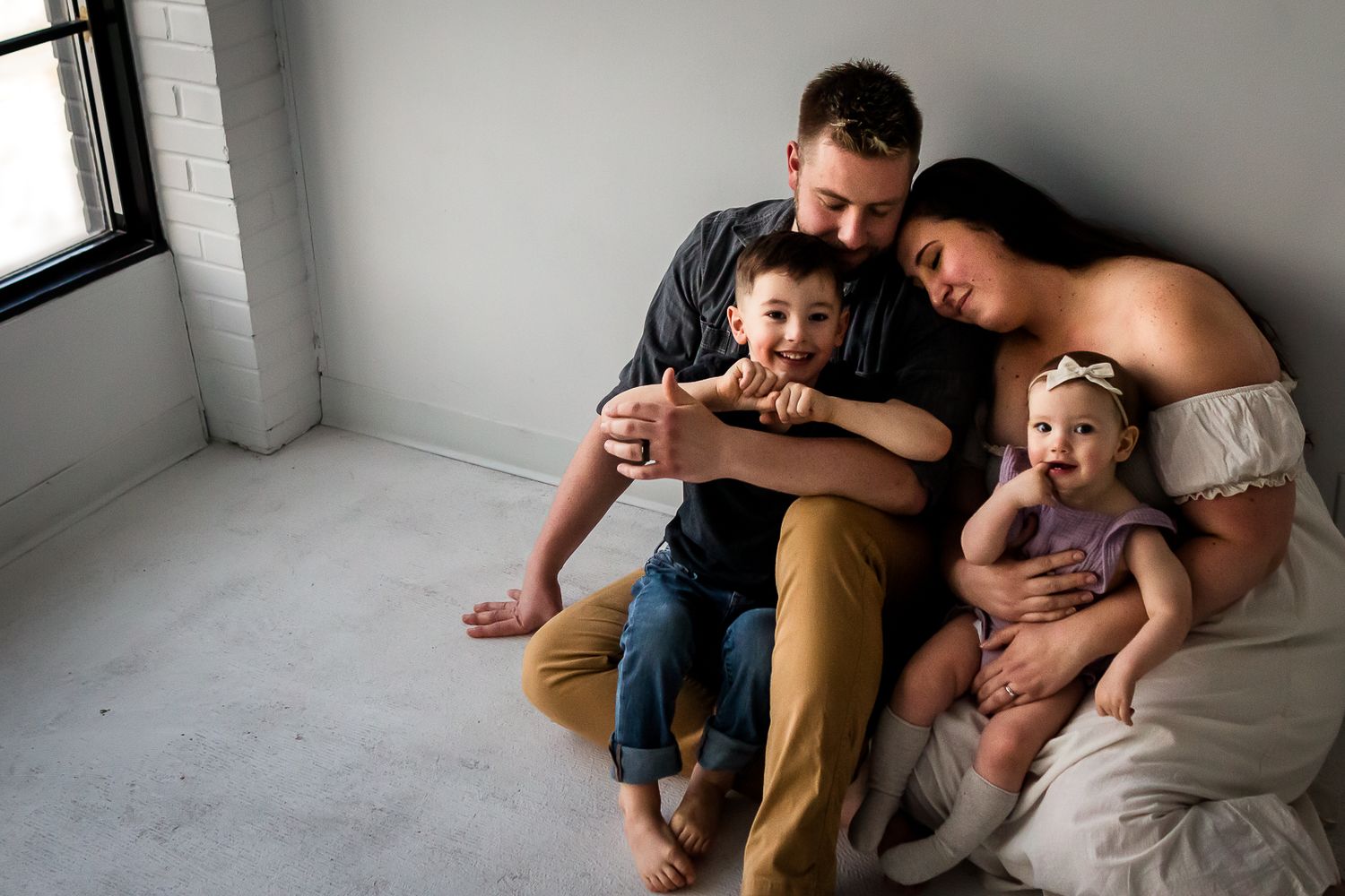 A beautiful authentic family mini session at Studio Boheme in Calgary AB by Love & Sunshine Photography.