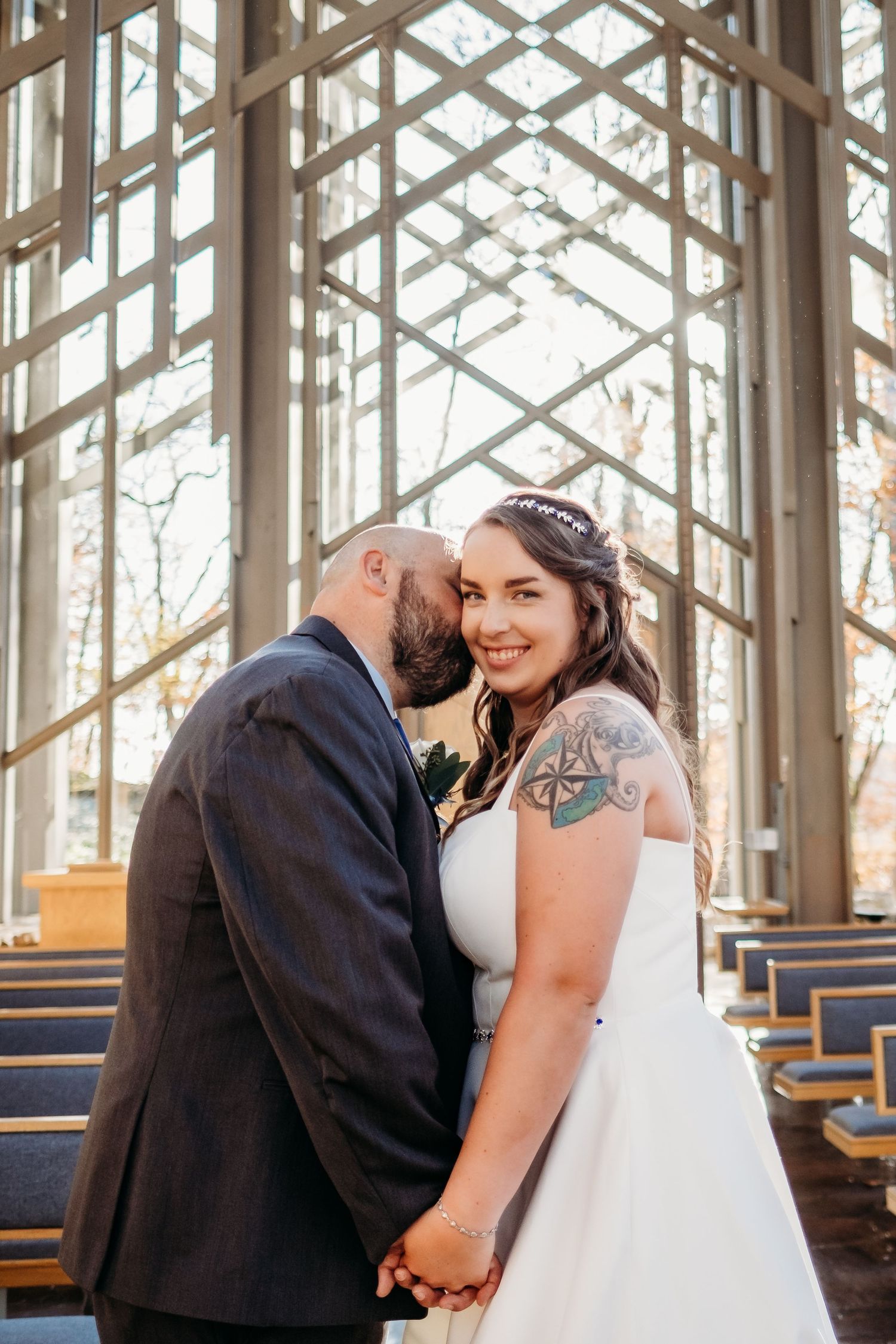 Couple poses for wedding at Throwncrown Chapel in Eureka Springs, Arkansas.