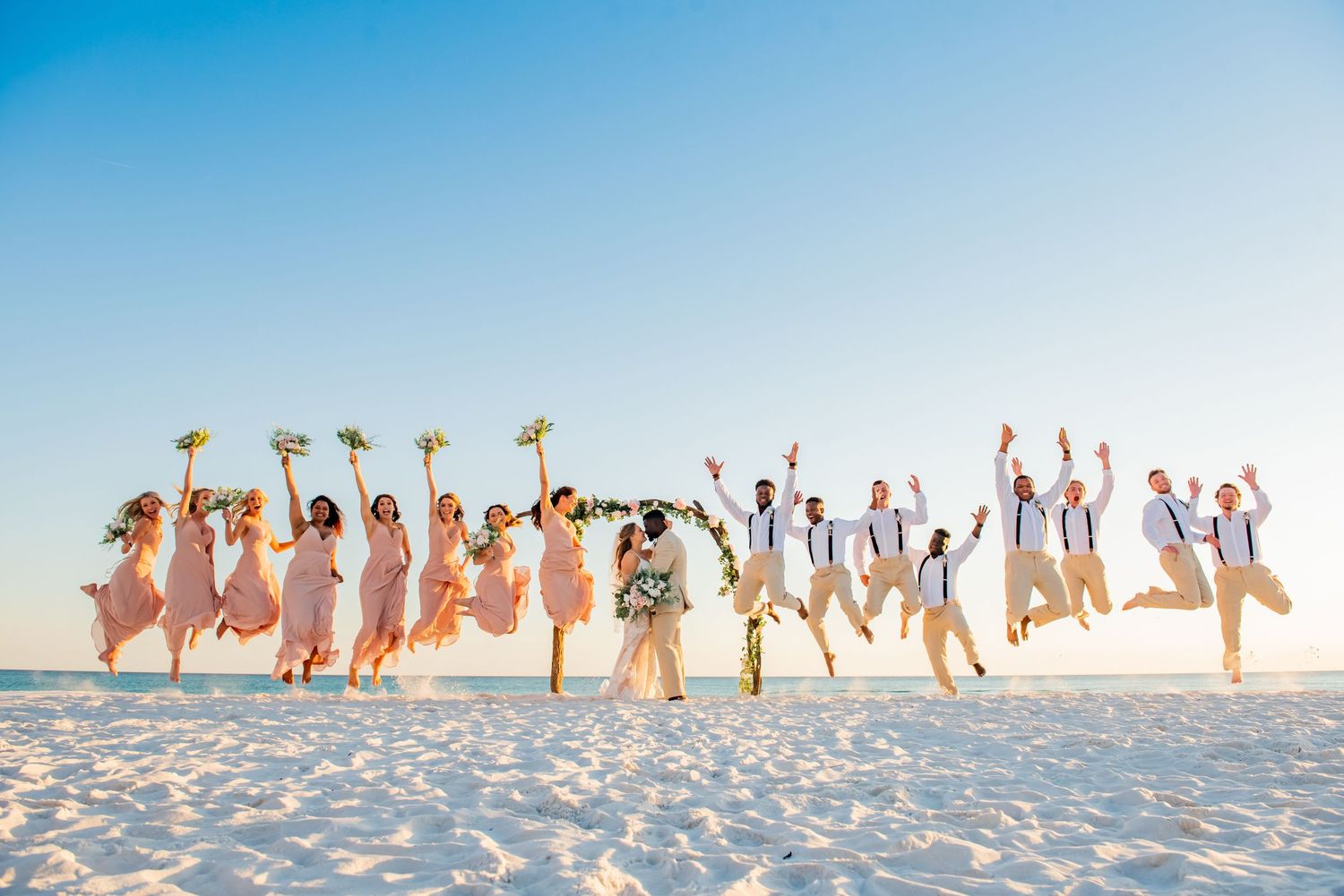 fun jumping wedding photo Panama City Beach