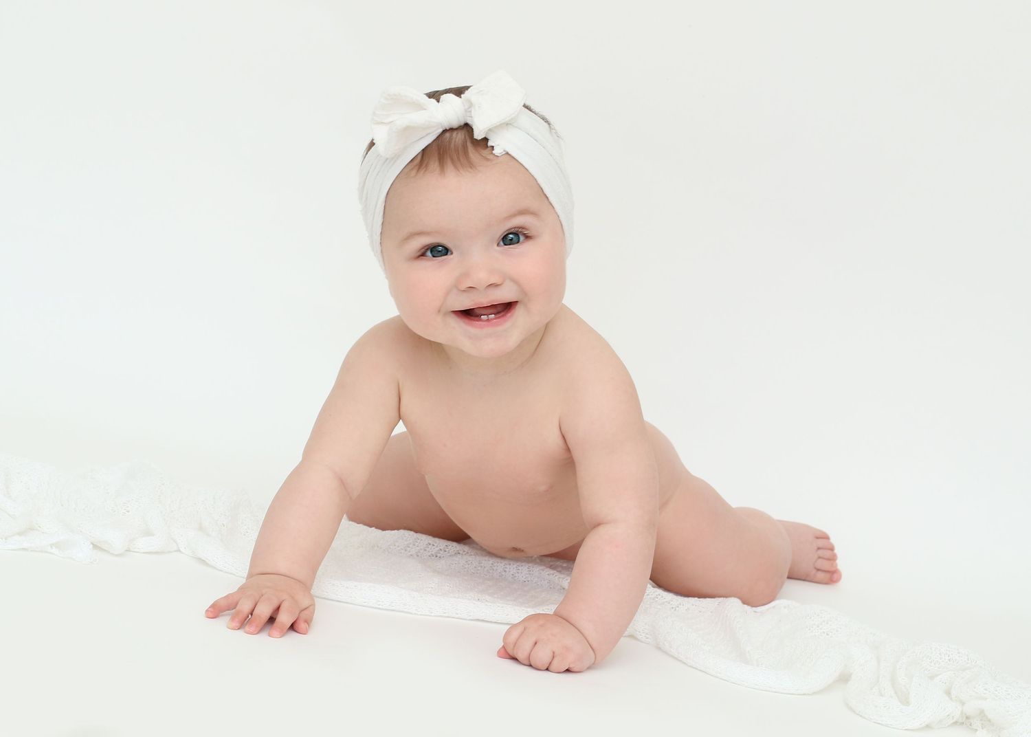 Baby Girl Sitter Session Pose. Newborn Photographer Tameside