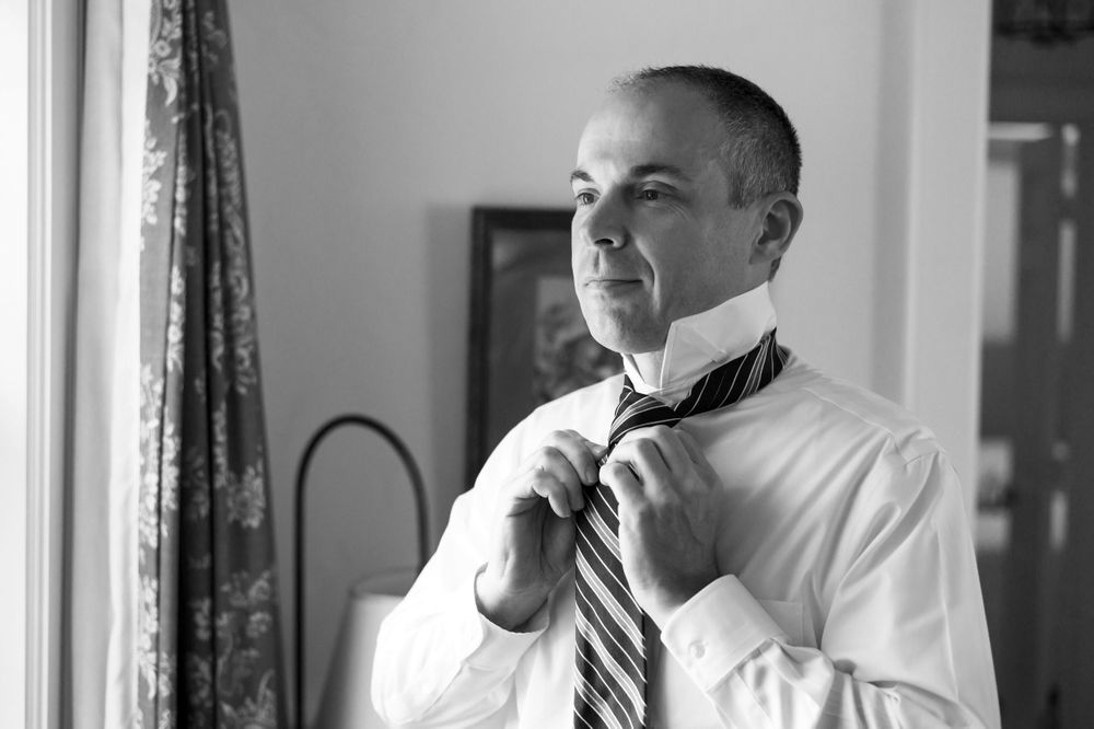 Groom getting ready for wedding at Chagrin Valley Hunt Club in Ohio.