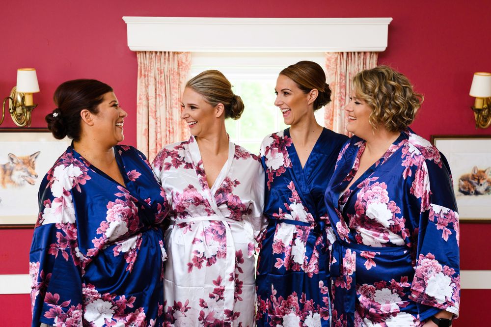 Bride and bridesmaids before wedding at Chagrin Valley Hunt Club in Ohio.