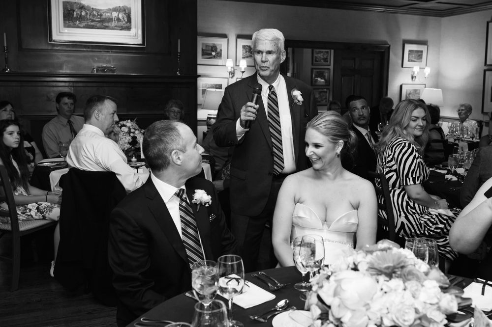 Toasts during wedding reception at Chagrin Valley Hunt Club.