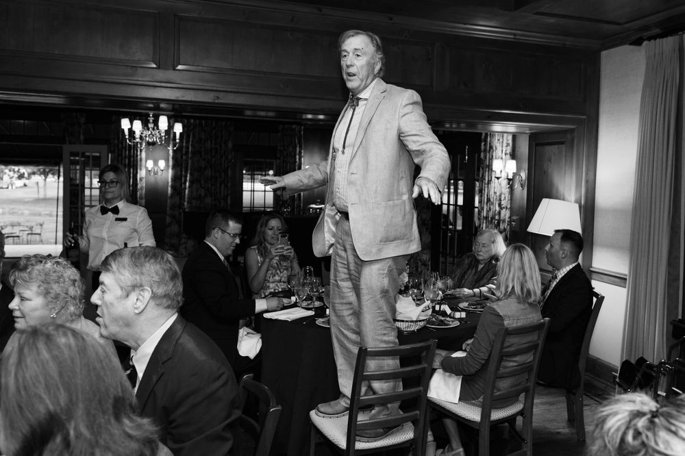 Uncle toasts bride and groom during reception at Chagrin Valley Hunt Club.