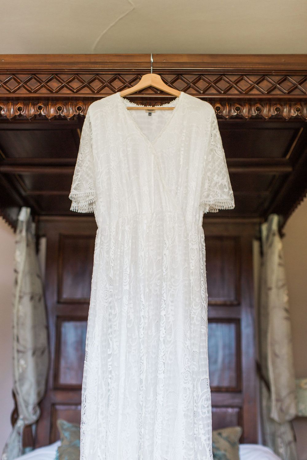 Hayley Elizabeth Photography Homme House Wedding Photographer West Midlands Micro wedding dress hanging from bed