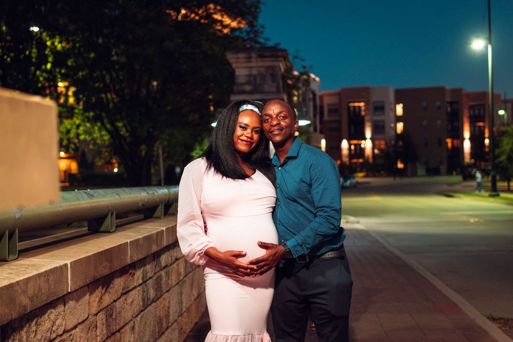 Mother and Father Hug excited for their future child to be born