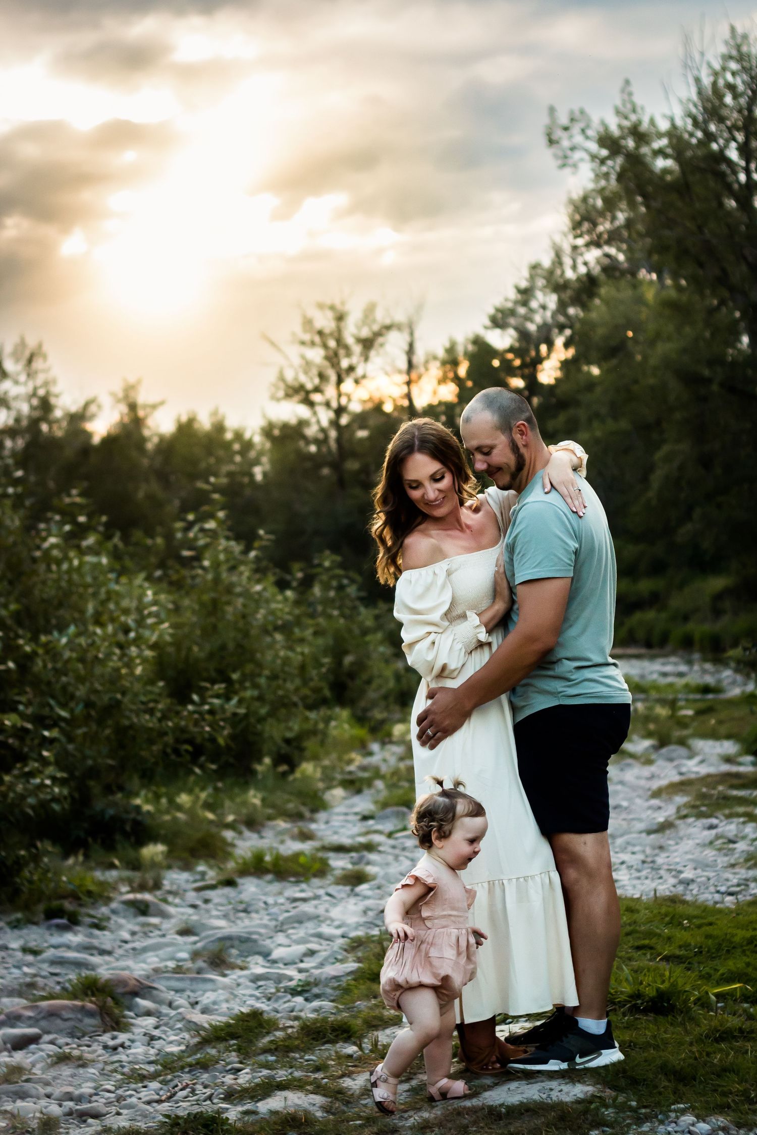 Beautiful authentic summer family photos during golden hour at Fish Creek Park in Calgary Alberta.