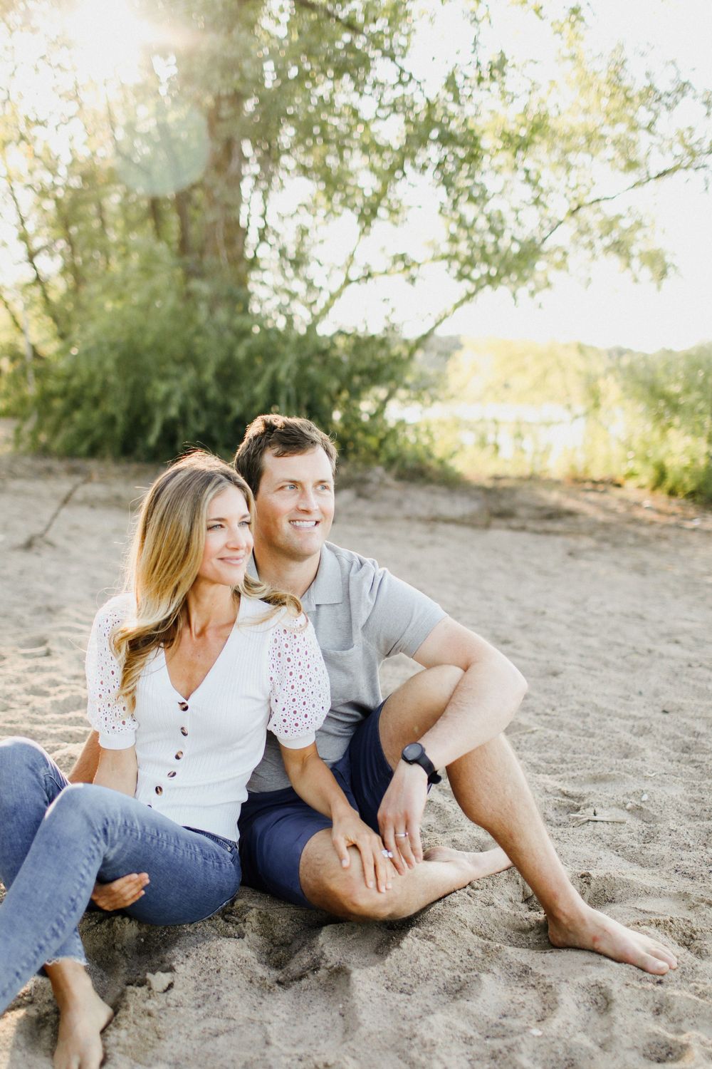Casual lifestyle photos of a family relaxing together on a sandy beach.