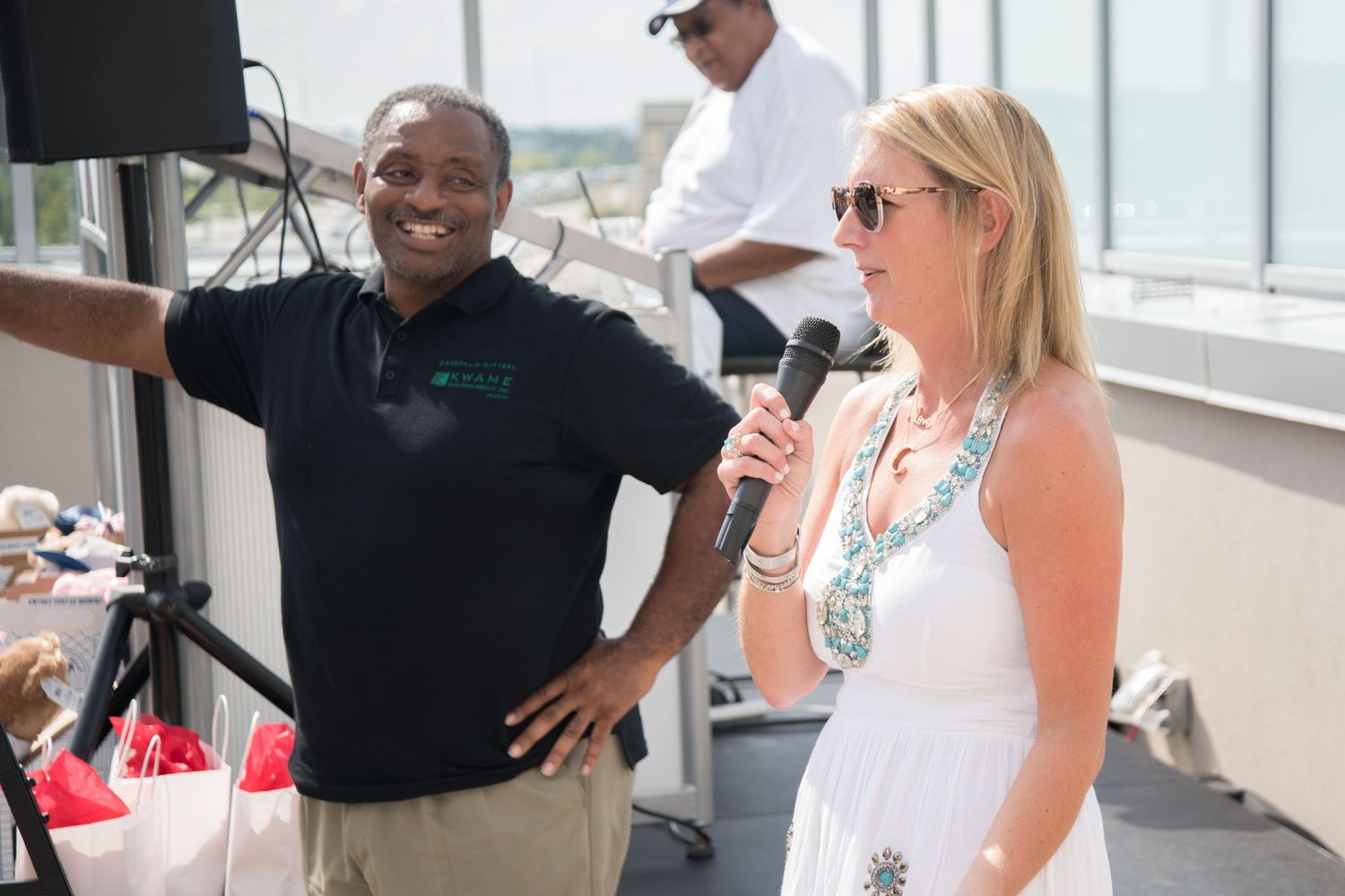 Carolyn Kindle Betz speaks at Kwame Foundation Fundraiser at Top Golf in ST. Louis