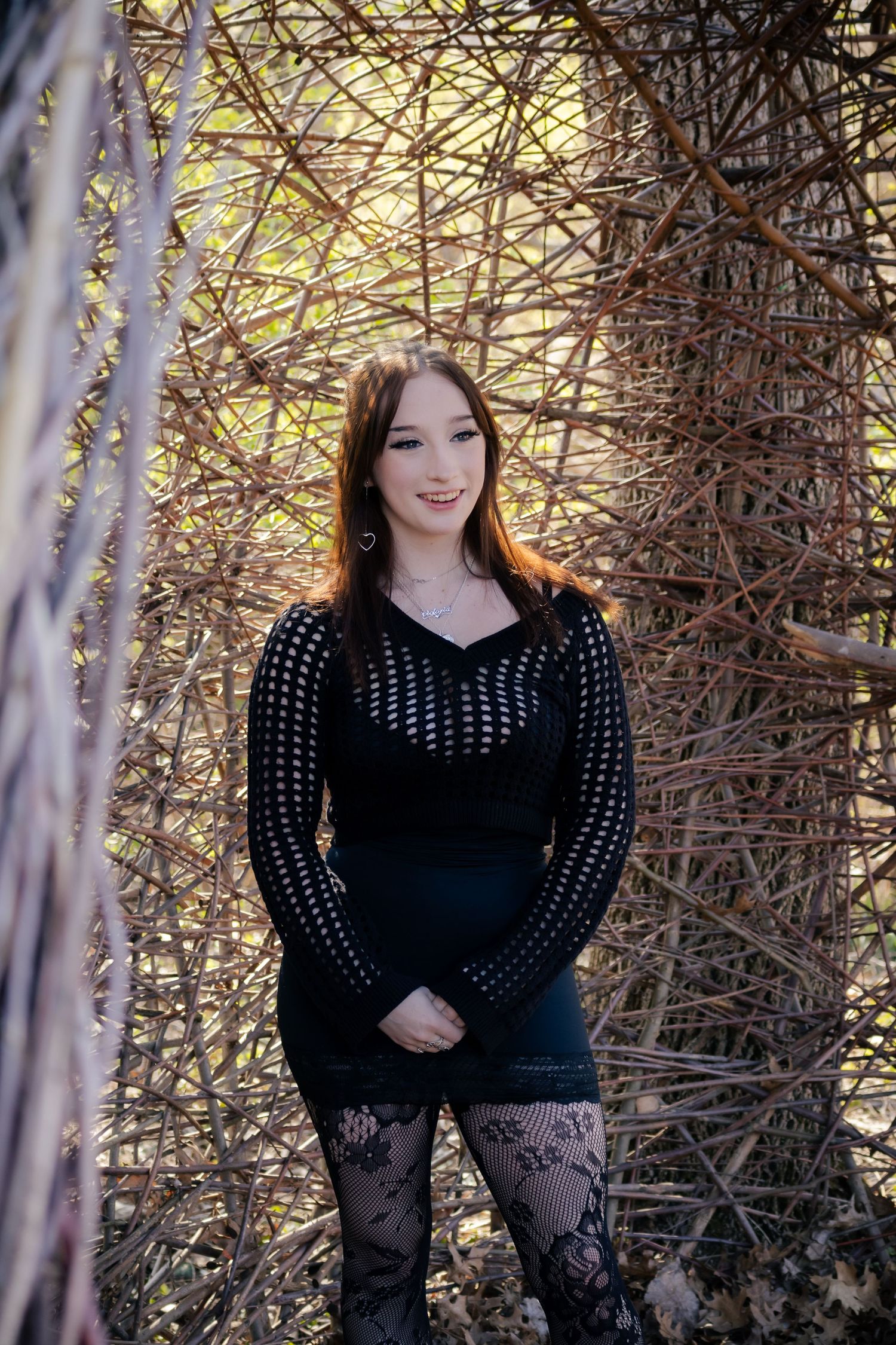 Outdoor spring senior photos at Lincoln Memorial Gardens in park in Springfield, Illinois