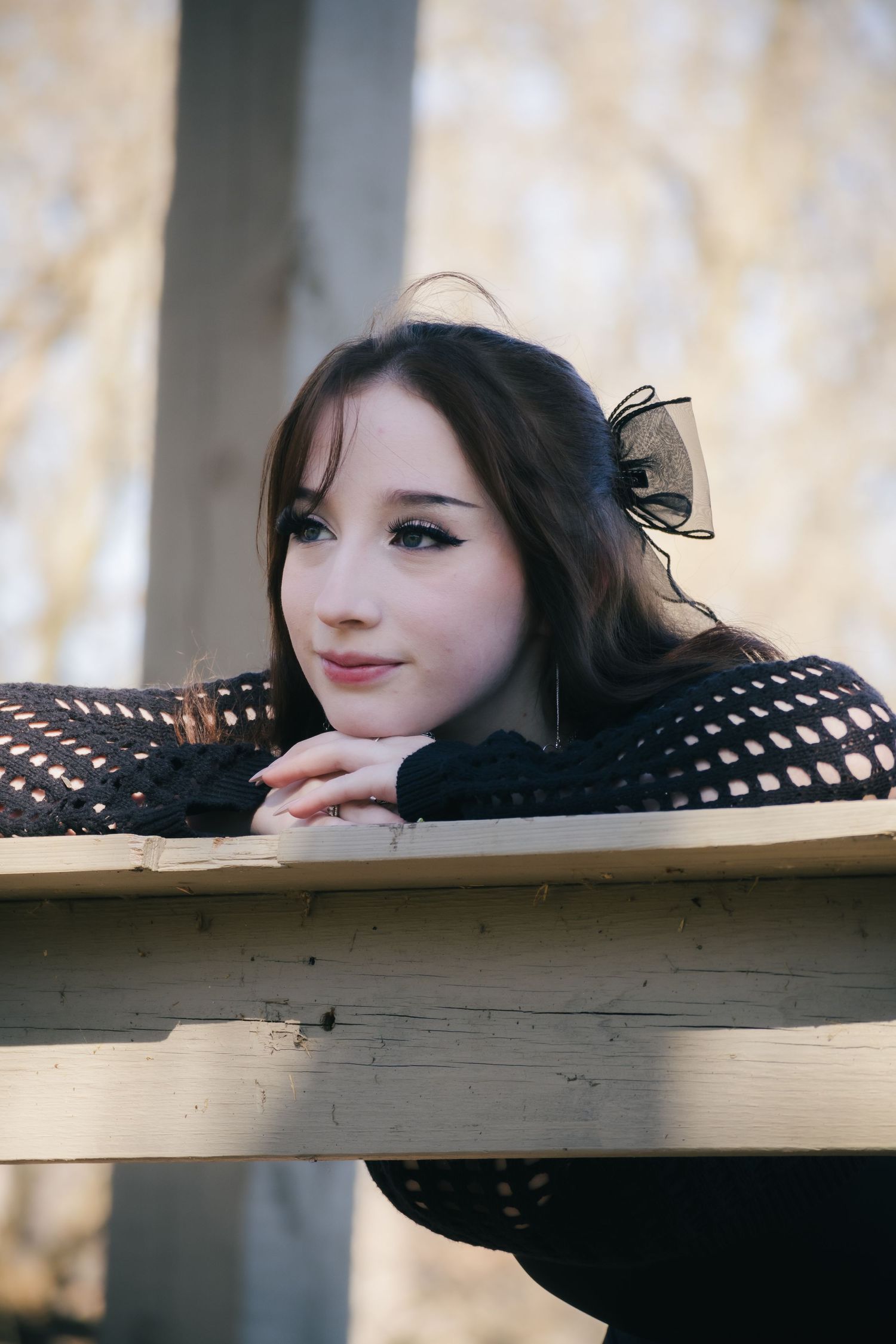 Outdoor spring senior photos at Lincoln Memorial Gardens in park in Springfield, Illinois