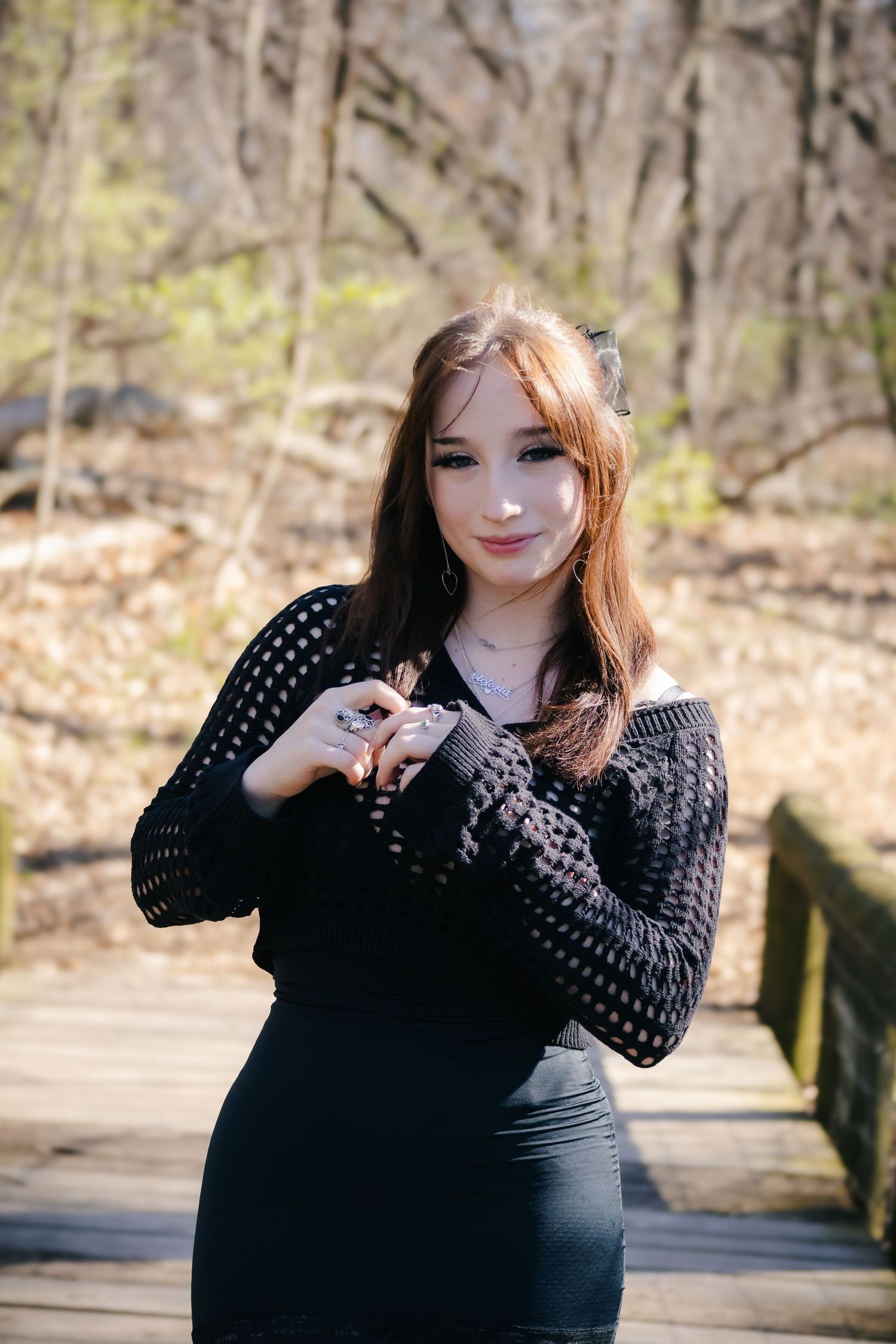 Outdoor spring senior photos at Lincoln Memorial Gardens in park in Springfield, Illinois