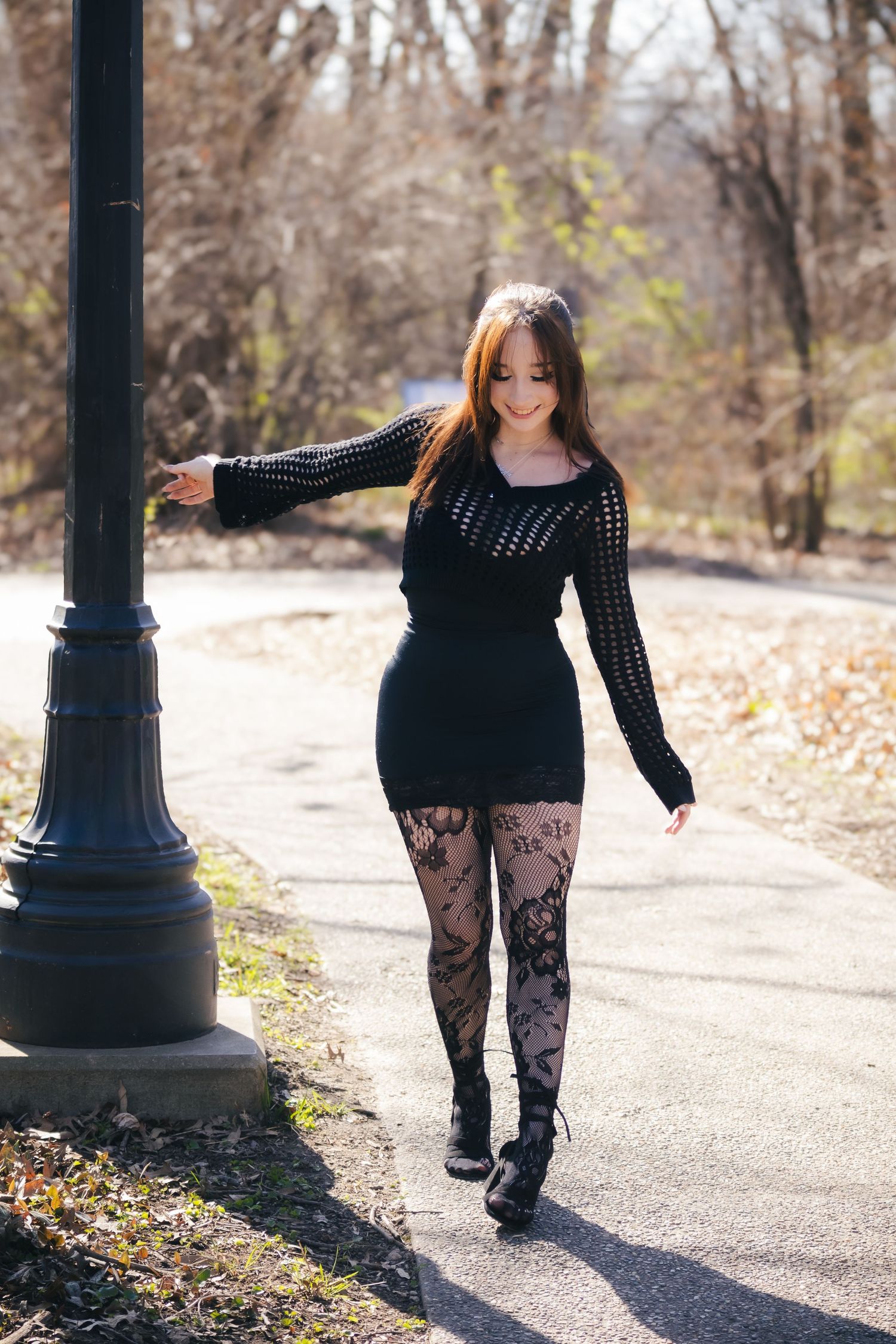 Outdoor spring senior photos at Lincoln Memorial Gardens in park in Springfield, Illinois