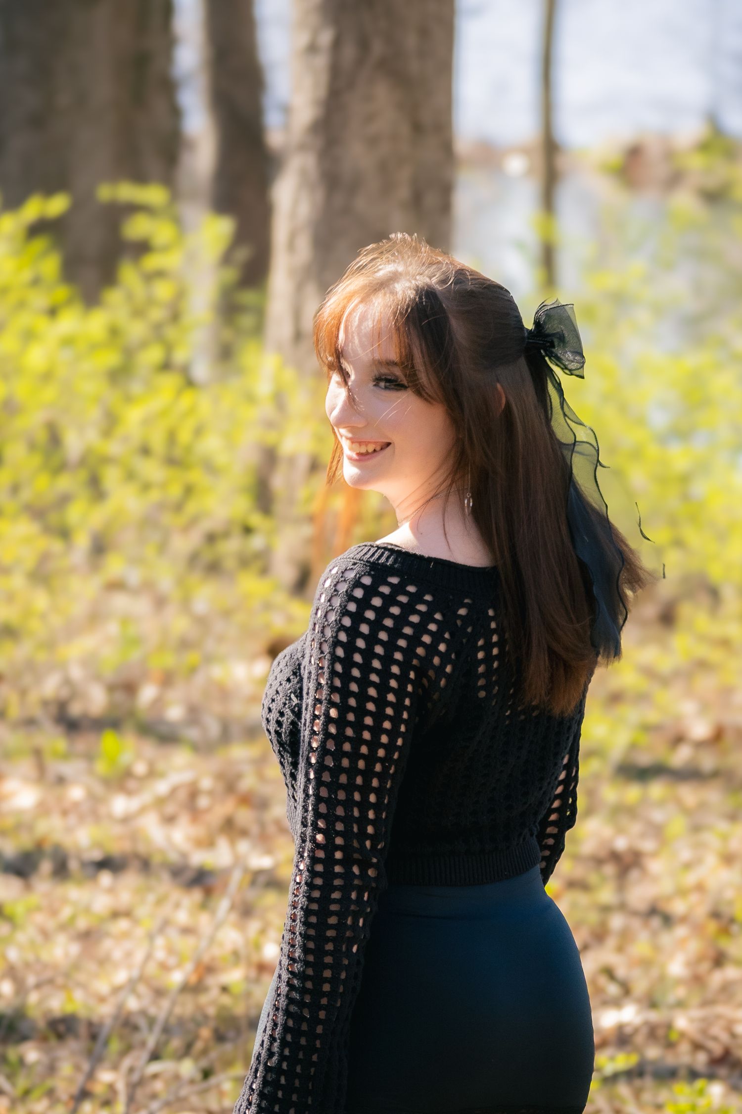Outdoor spring senior photos at Lincoln Memorial Gardens in park in Springfield, Illinois