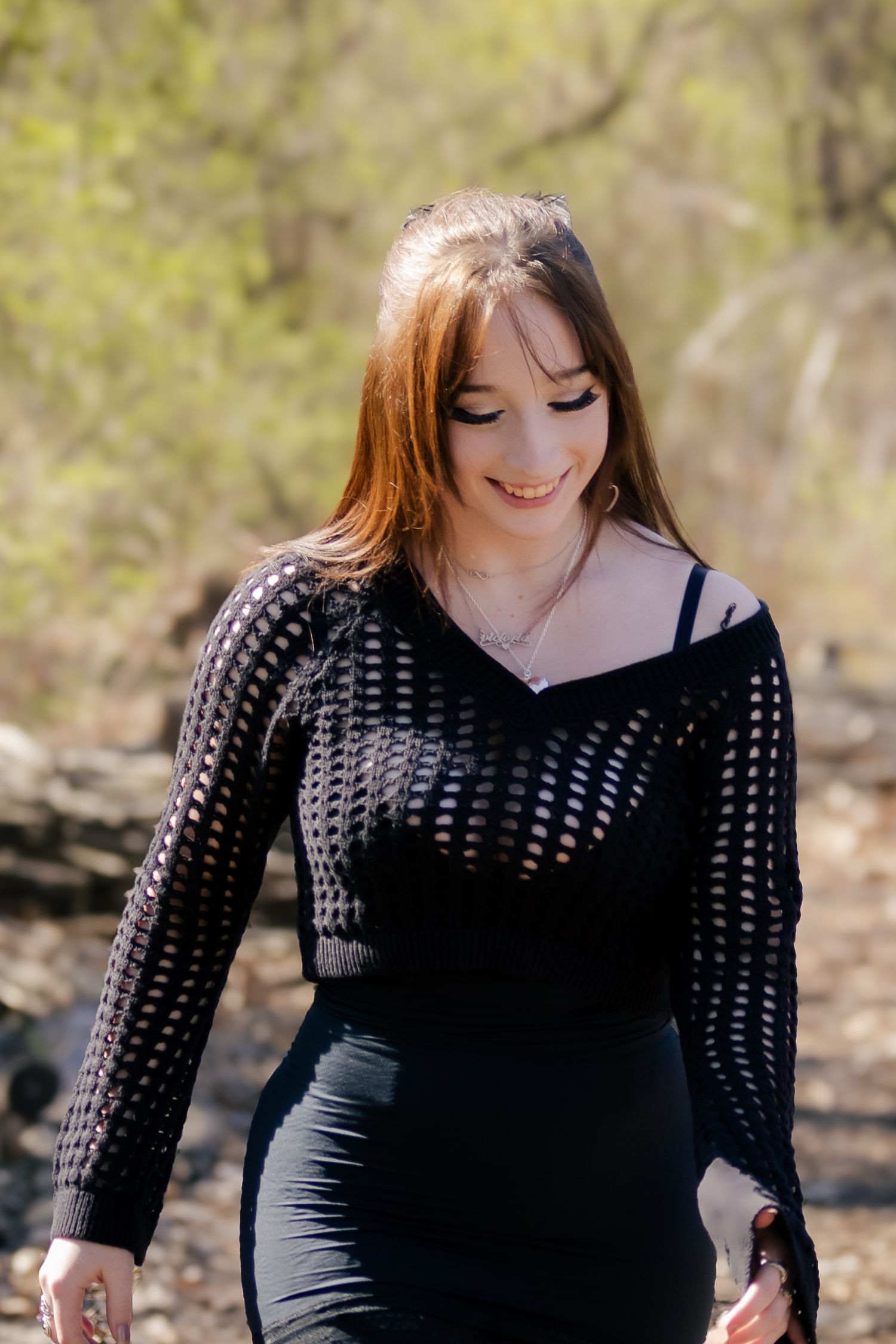 Outdoor spring senior photos at Lincoln Memorial Gardens in park in Springfield, Illinois