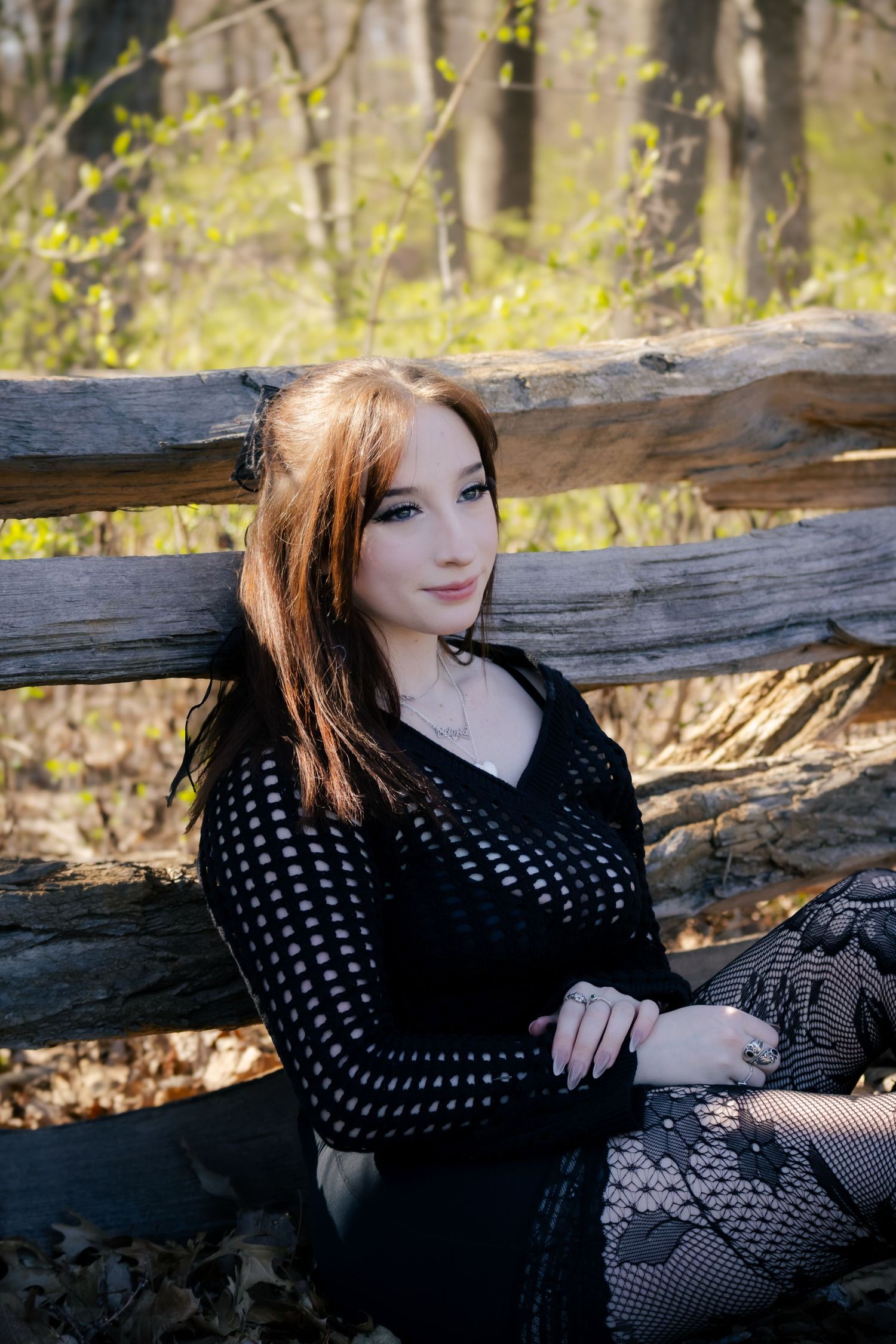 Outdoor spring senior photos at Lincoln Memorial Gardens in park in Springfield, Illinois