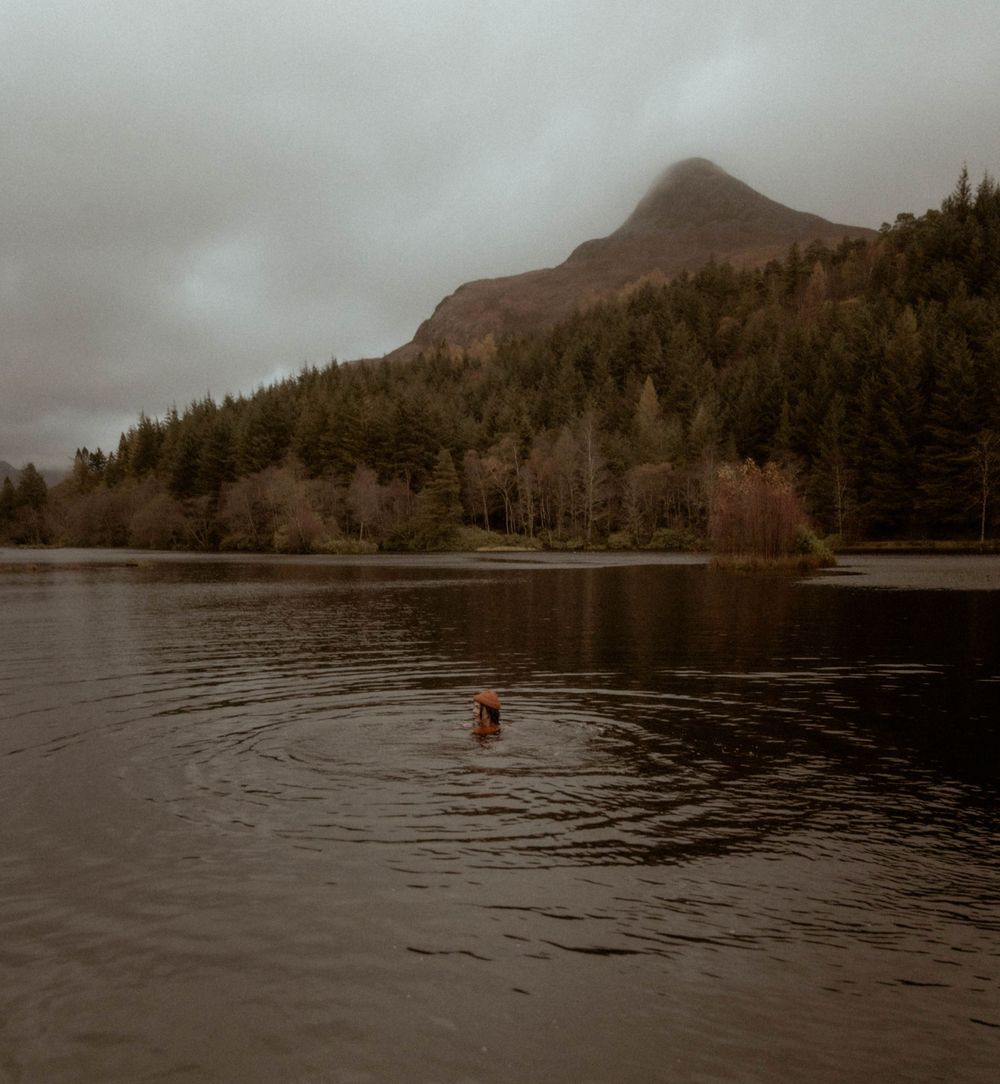 family playing in river