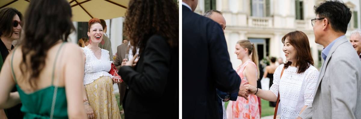 Wedding guests mingle and chat during an outdoor reception event.