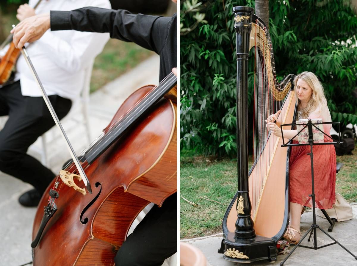 A wedding musician duo performs with a classical cello and ornate golden harp in an outdoor garden setting.