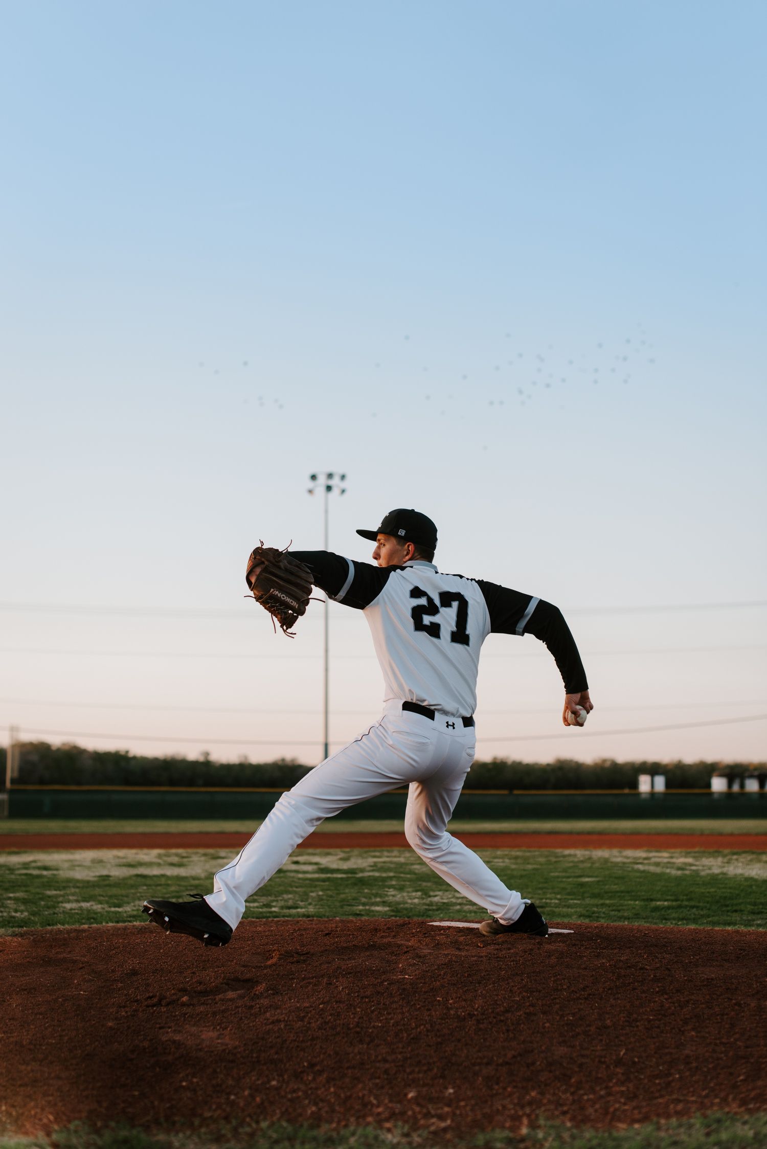 Campus Haysville high school senior pictures at baseball field - Derby, Wichita, KS photographer