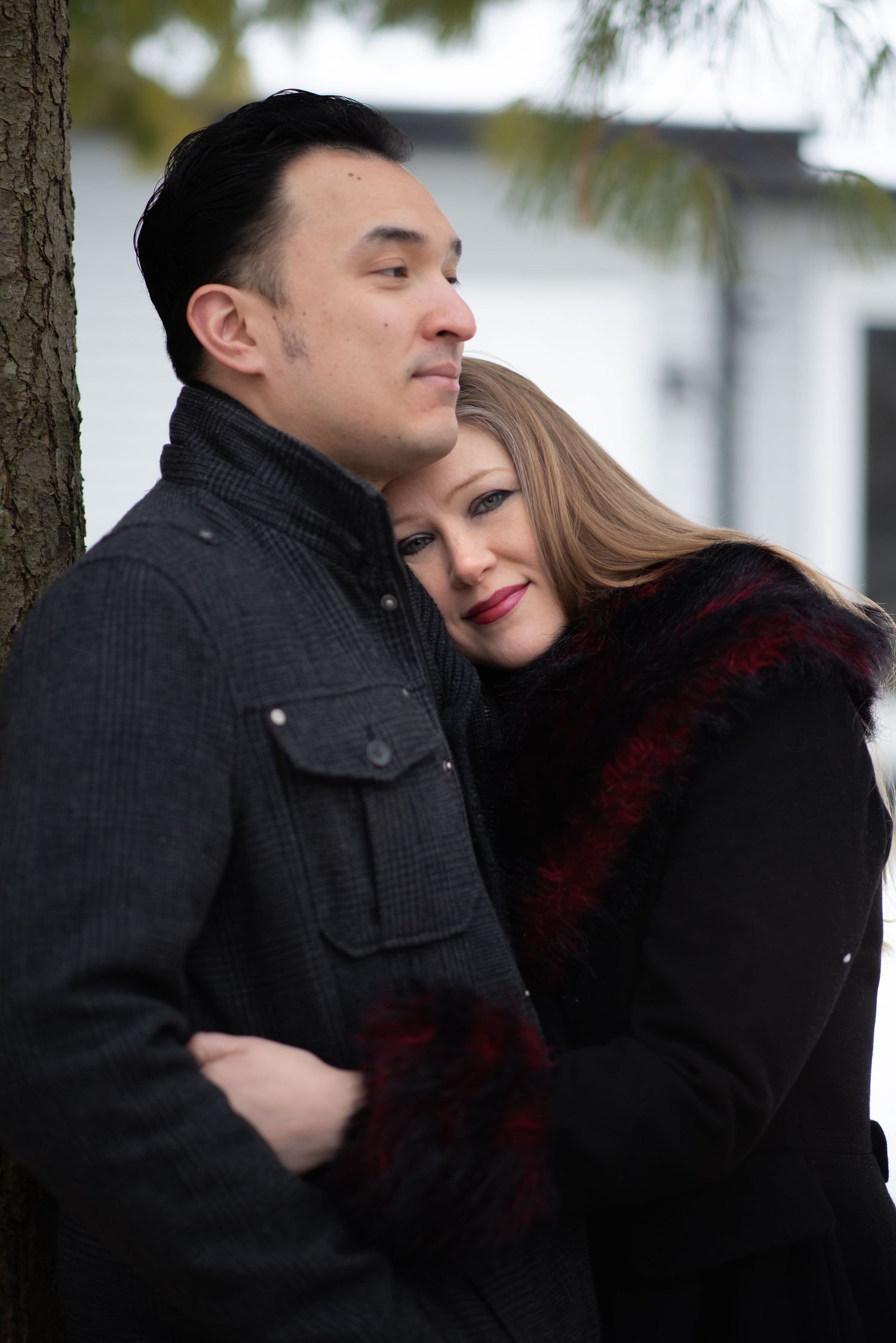 couple love engaged hugs winter portrait photo