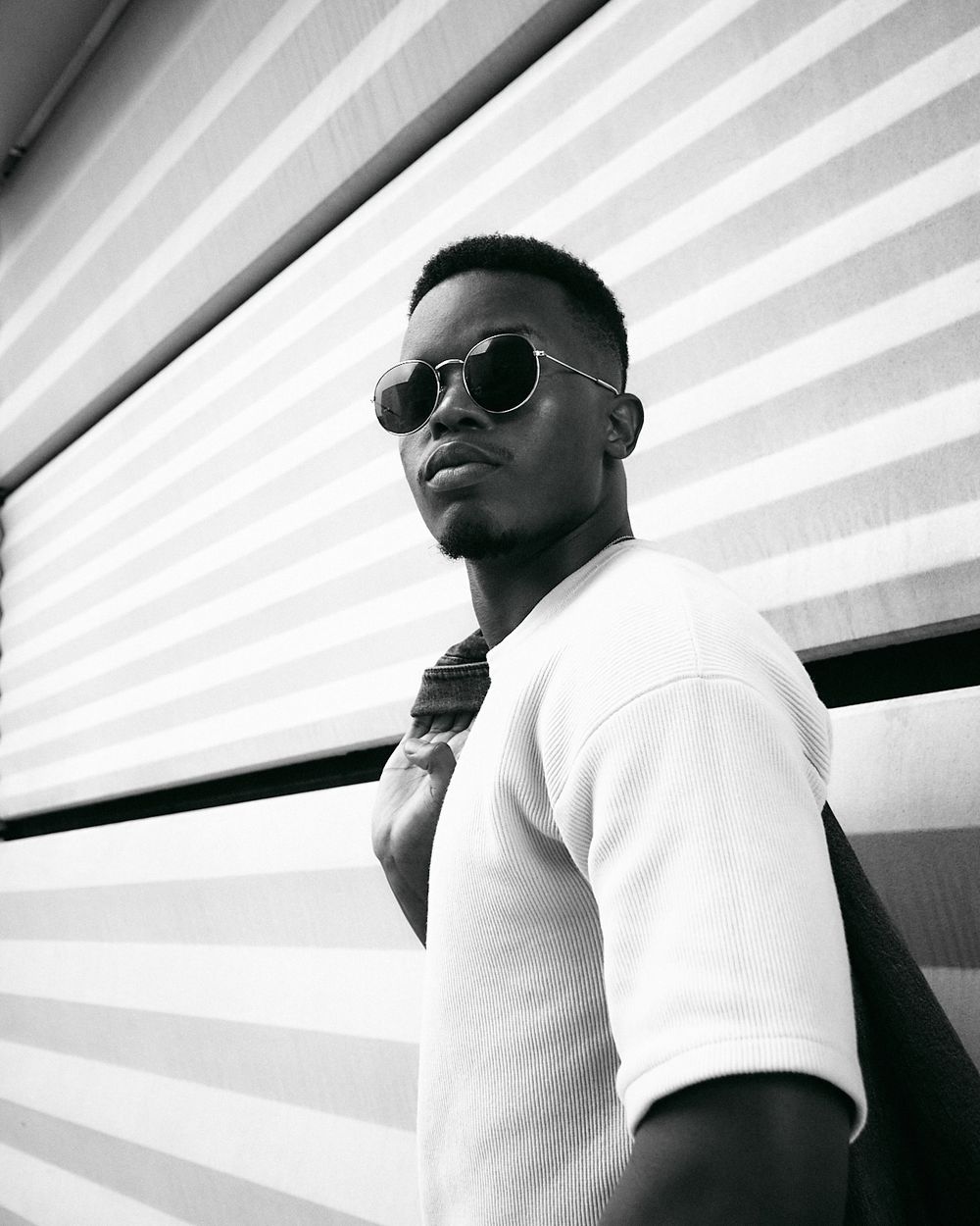 Black and white Legacy portrait style commercial shoot young Zimbabwe man