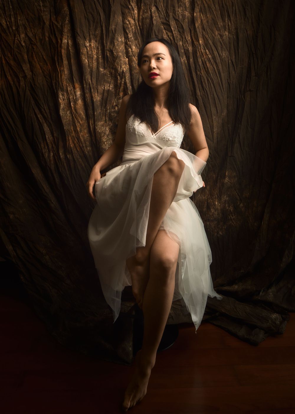 Beautiful Chinese lady posing for her legacy portrait elegant timeless traditional portraiture