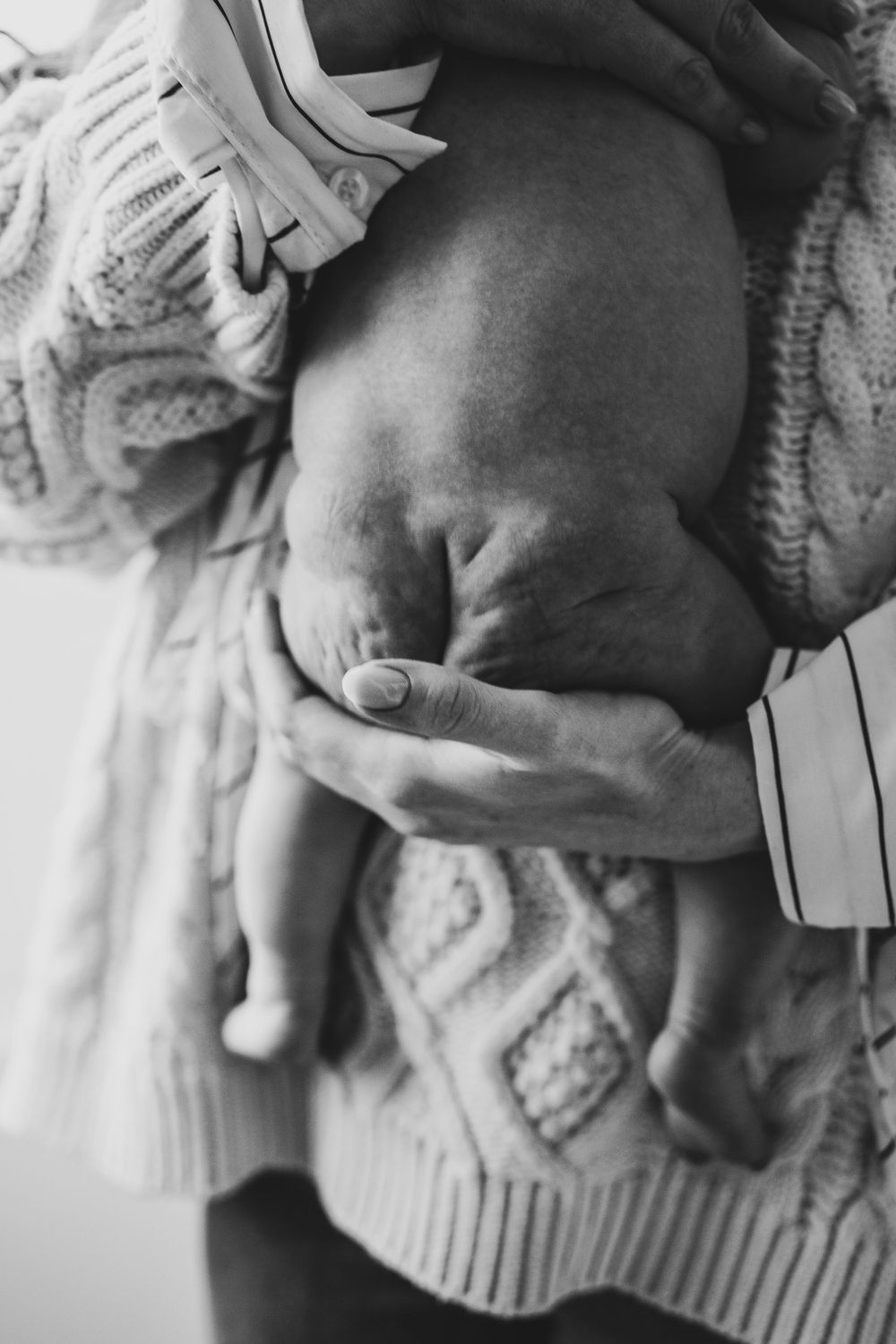 Newborn baby pasgeboren baby details handjes voetjes fotografie