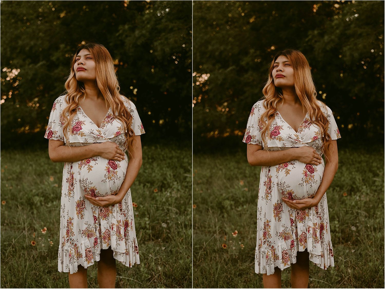Expectant woman in floral white dress poses outdoors in golden sunlight during maternity photoshoot.
