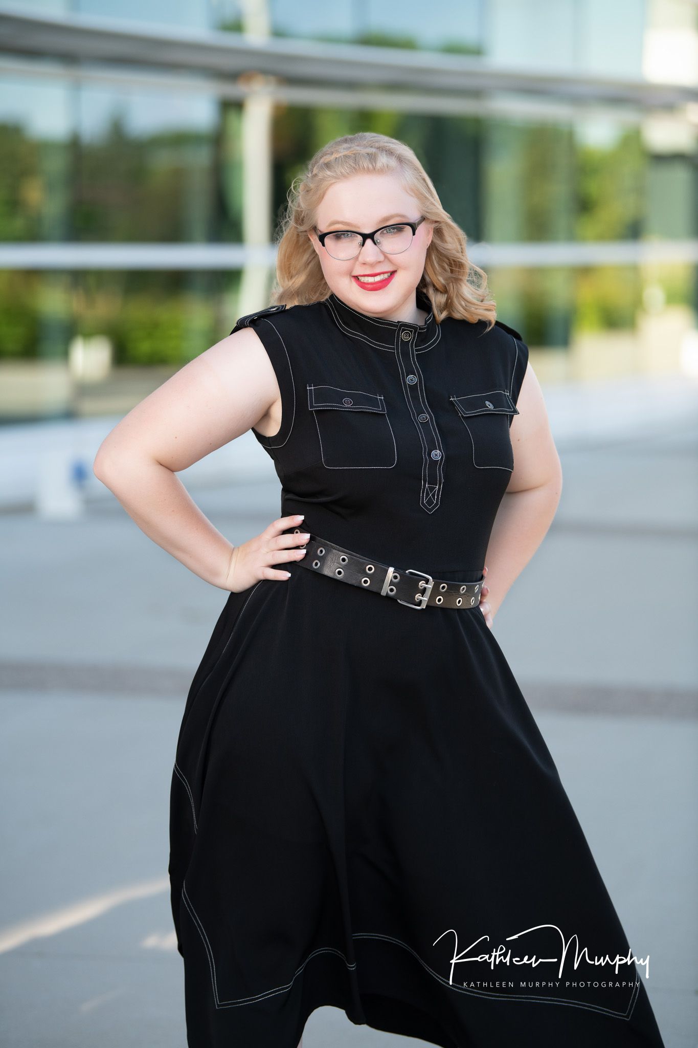 Kathleen Murphy Photography picture of a girl in a black dress with hands on hip