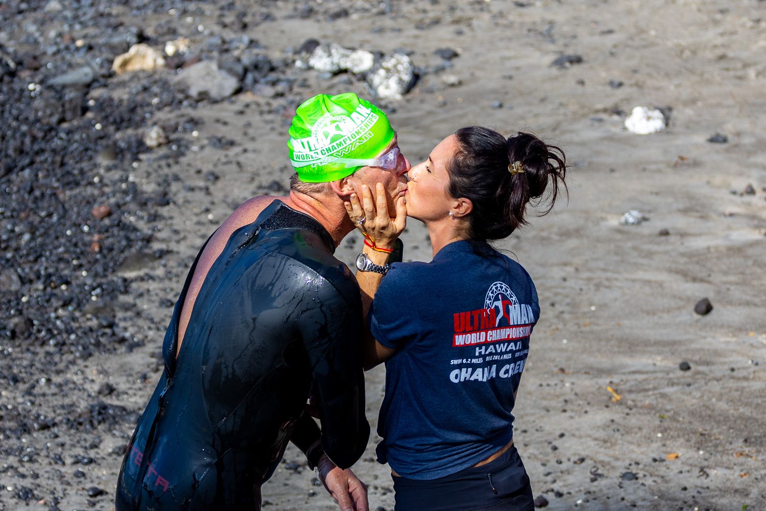 Two competitors sharing a celebratory moment during an endurance event.