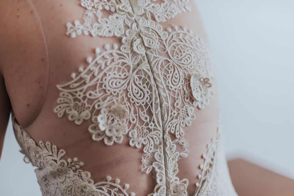 Beautiful detailed image of the lace on the back of a wedding gown.